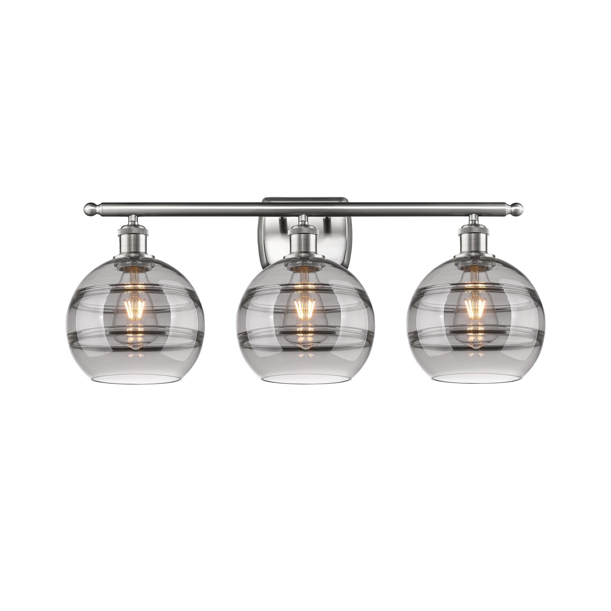 Shown in Brushed Satin Nickel finish and Light Smoke glass