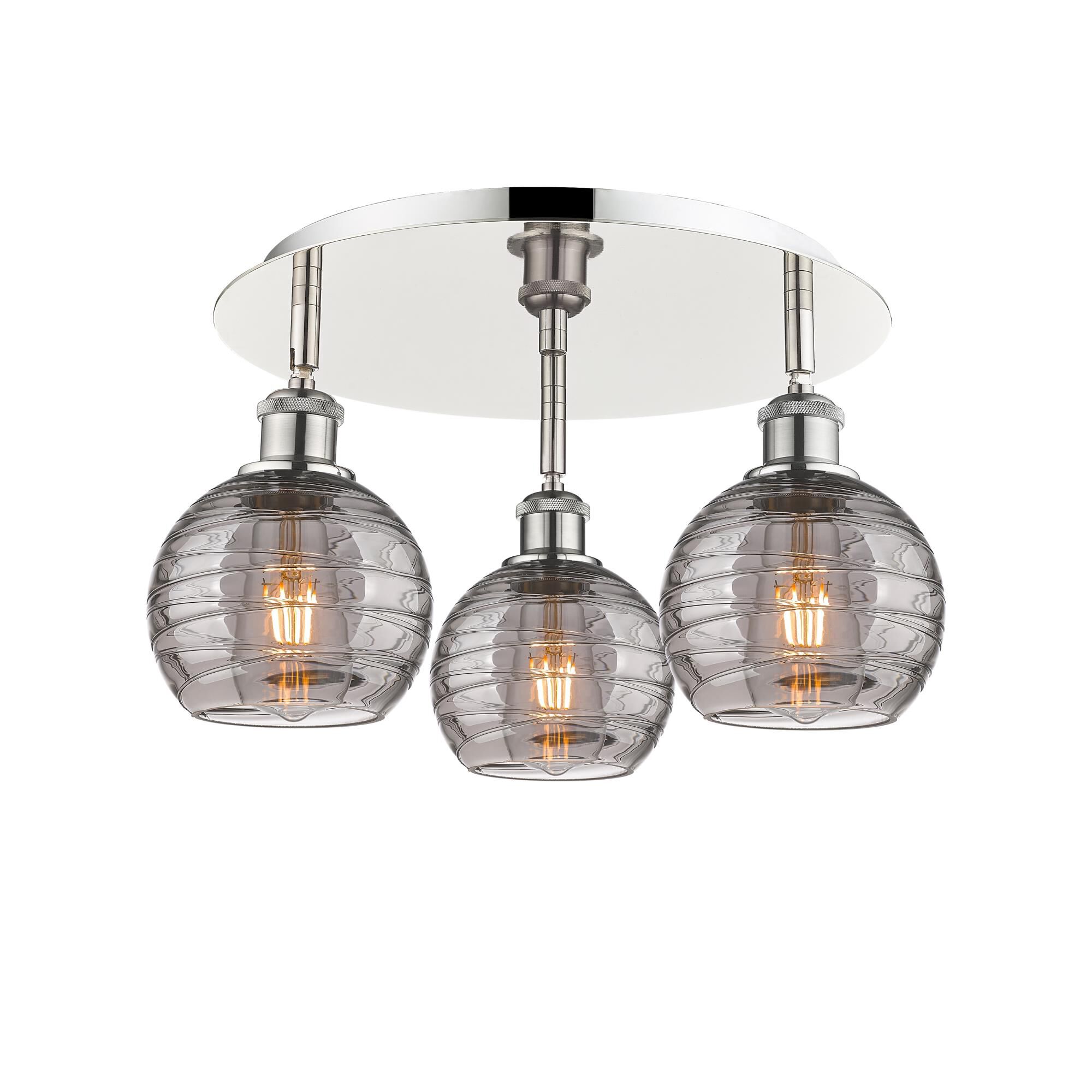 Shown in Polished Nickel finish and Light Smoke Deco Swirl glass