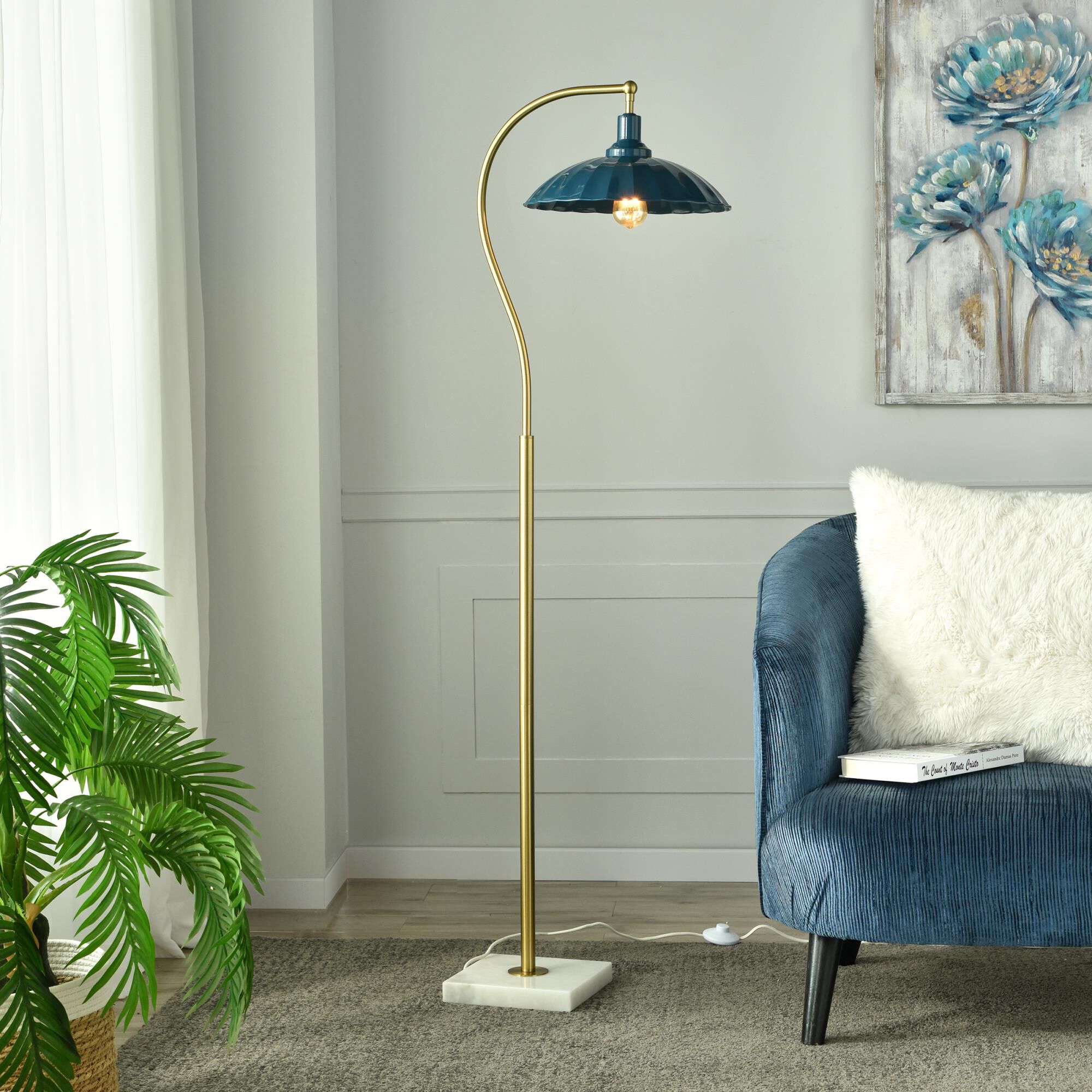 Shown in White Marble and Polished Brass finish and Glossy Navy shade