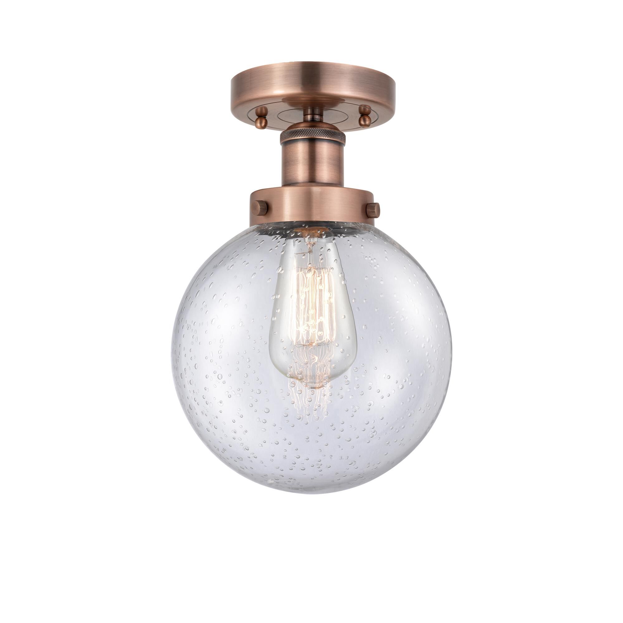 Shown in Antique Copper finish and Seedy glass