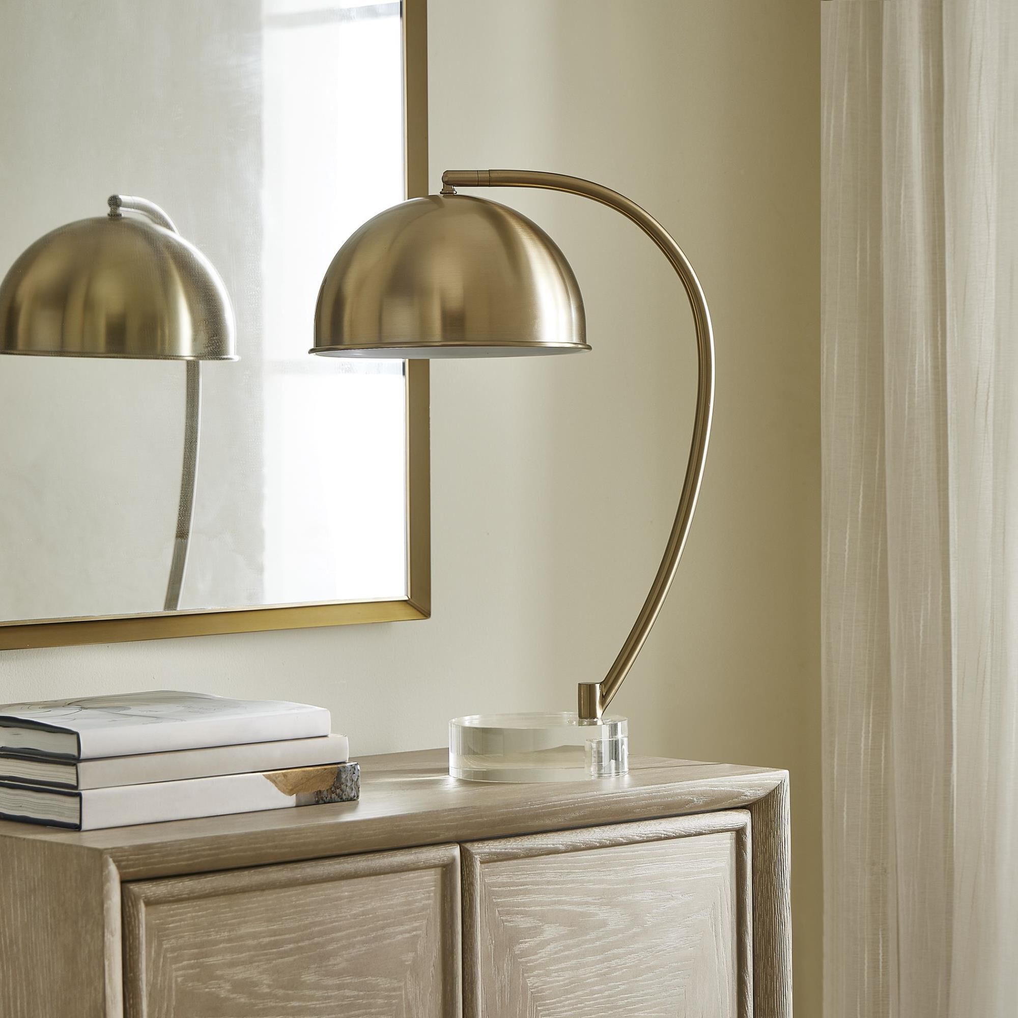 Shown in Brass and Gold finish and Round shade