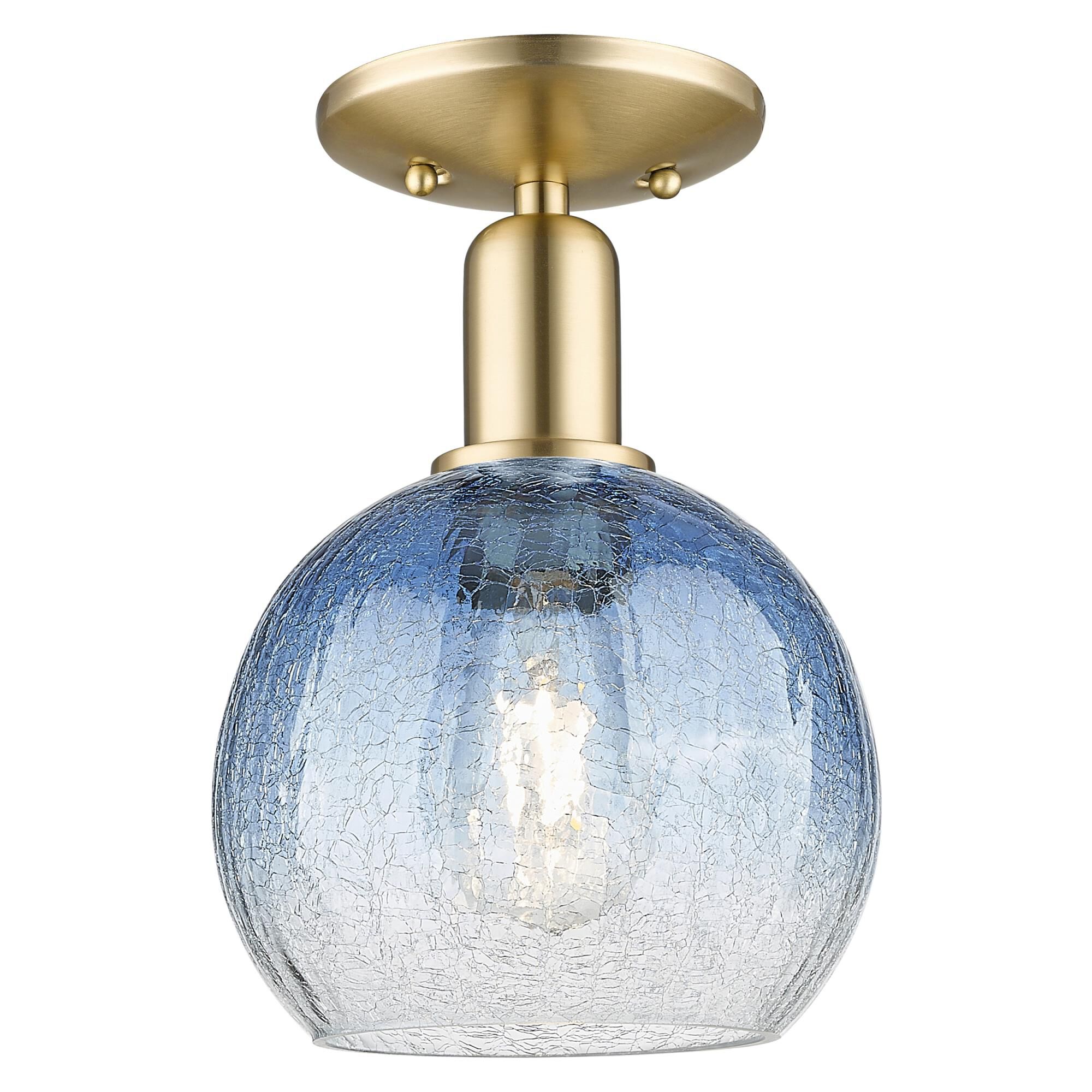 Shown in Champagne Bronze finish and Sapphire Blue glass