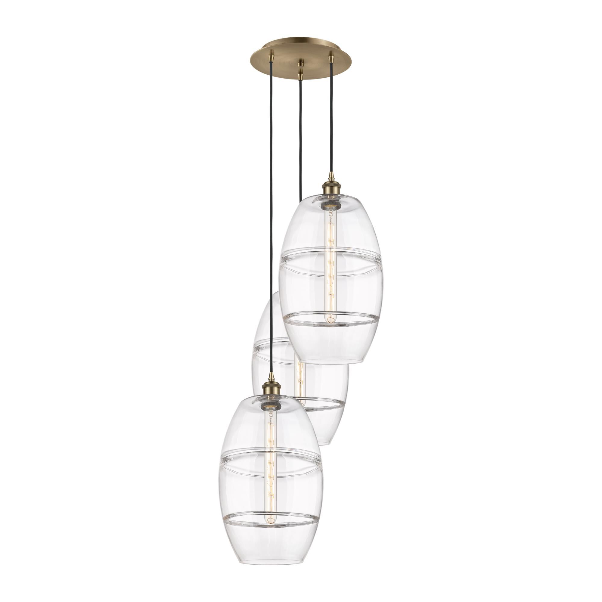 Shown in Antique Brass finish and Clear glass