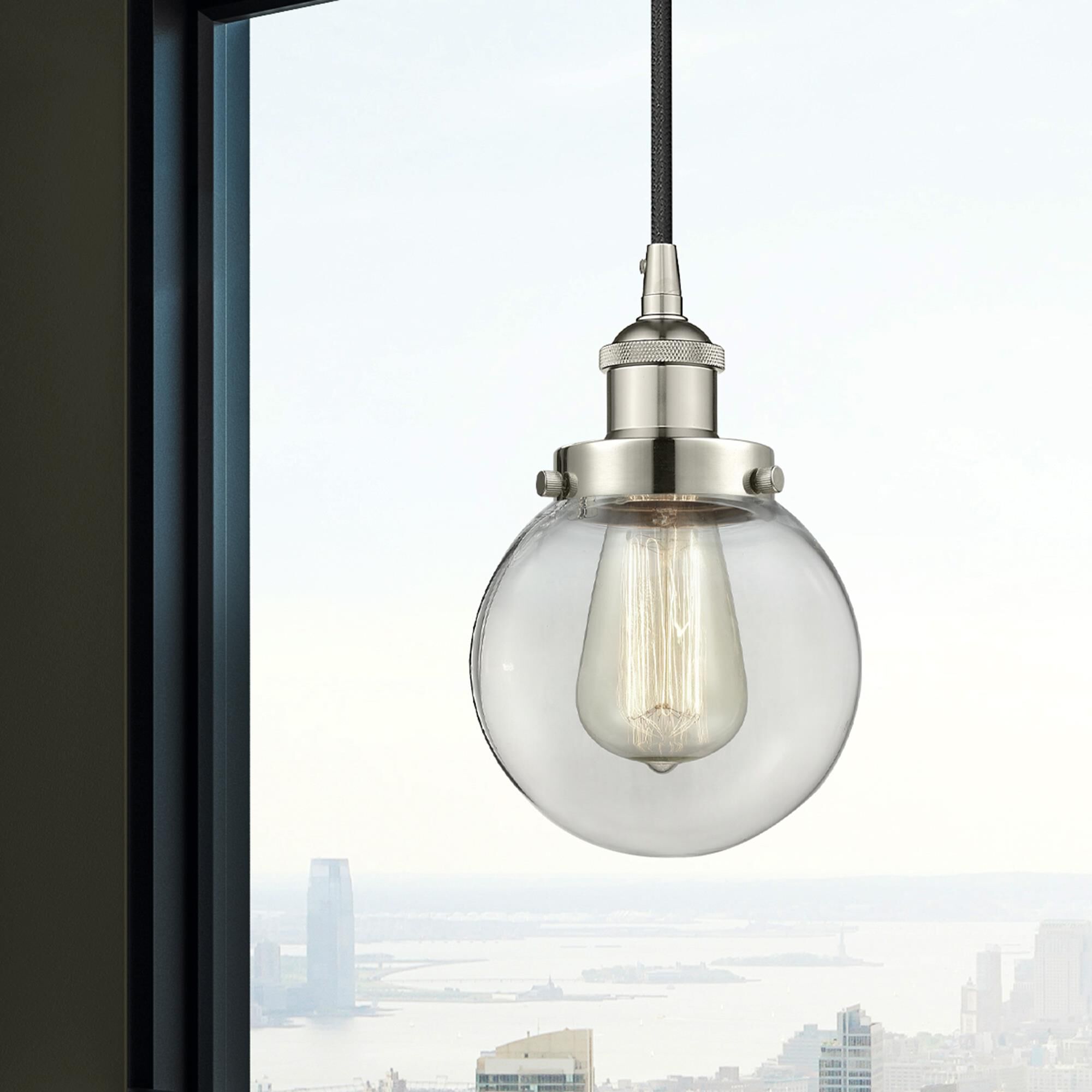 Shown in Polished Nickel finish and Clear glass