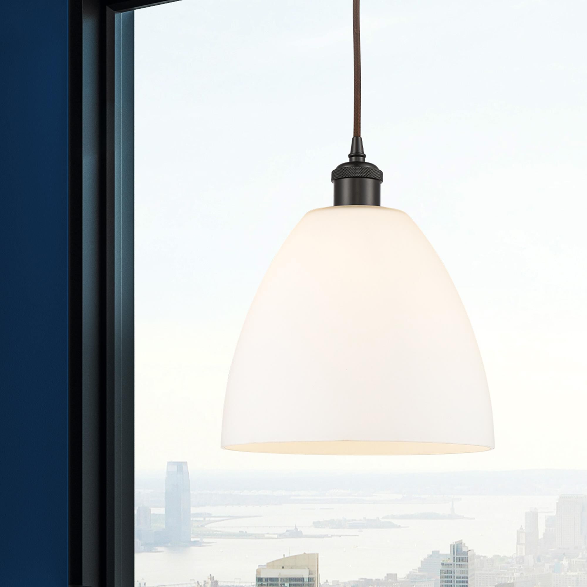 Shown in Oil Rubbed Bronze finish and Matte White glass