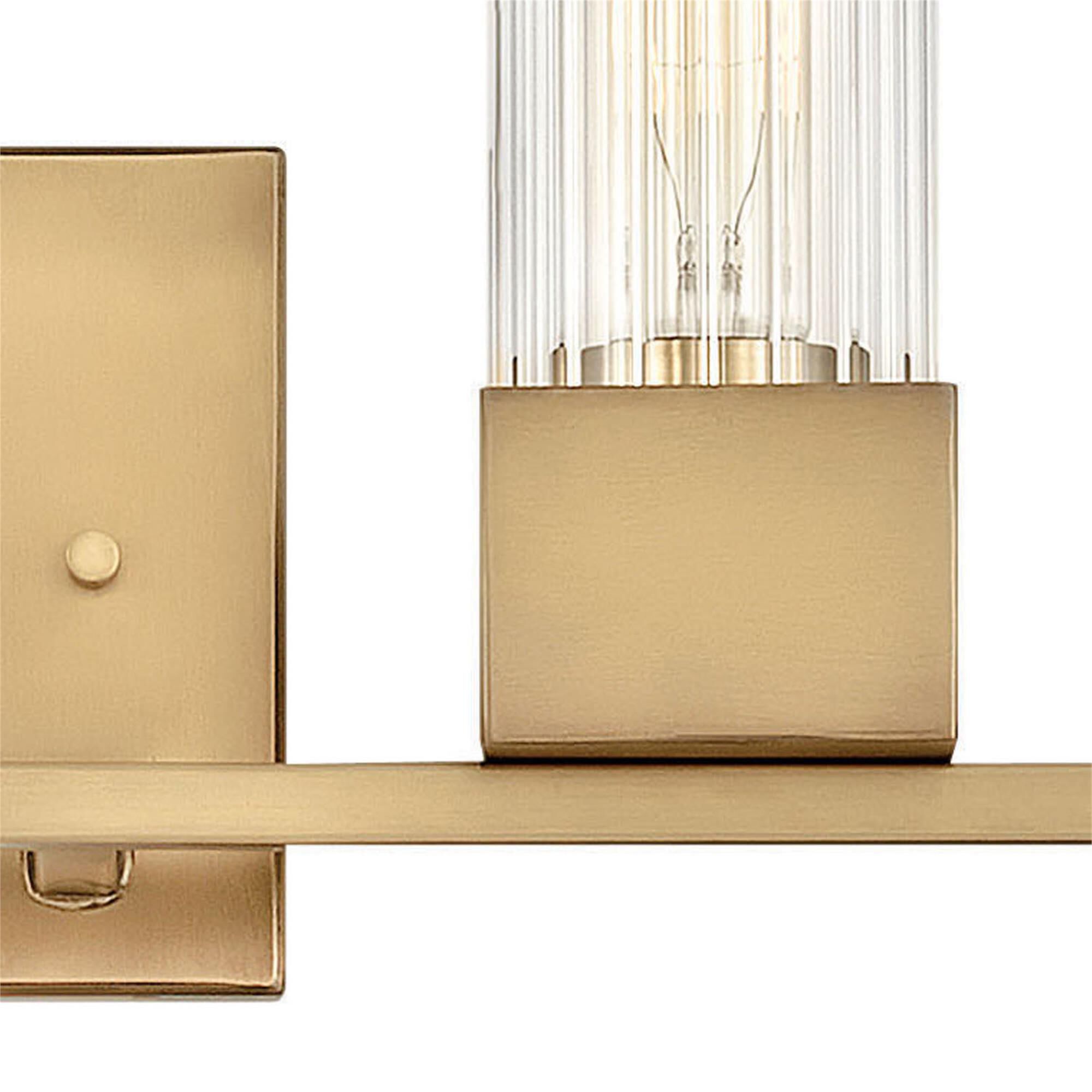 Shown in Heritage Brass finish and Ribbed Clear glass