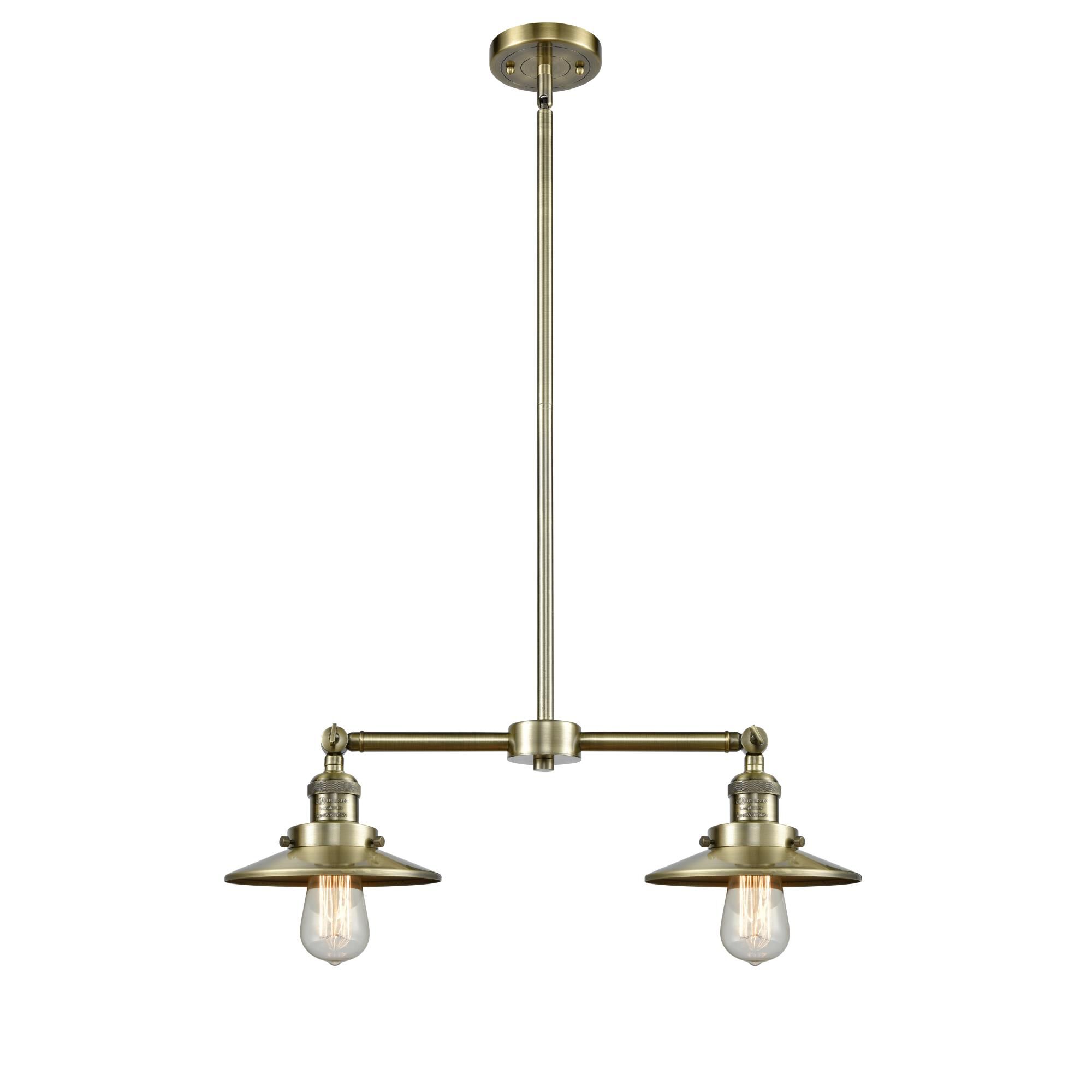 Shown in Antique Brass finish and Antique Brass shade