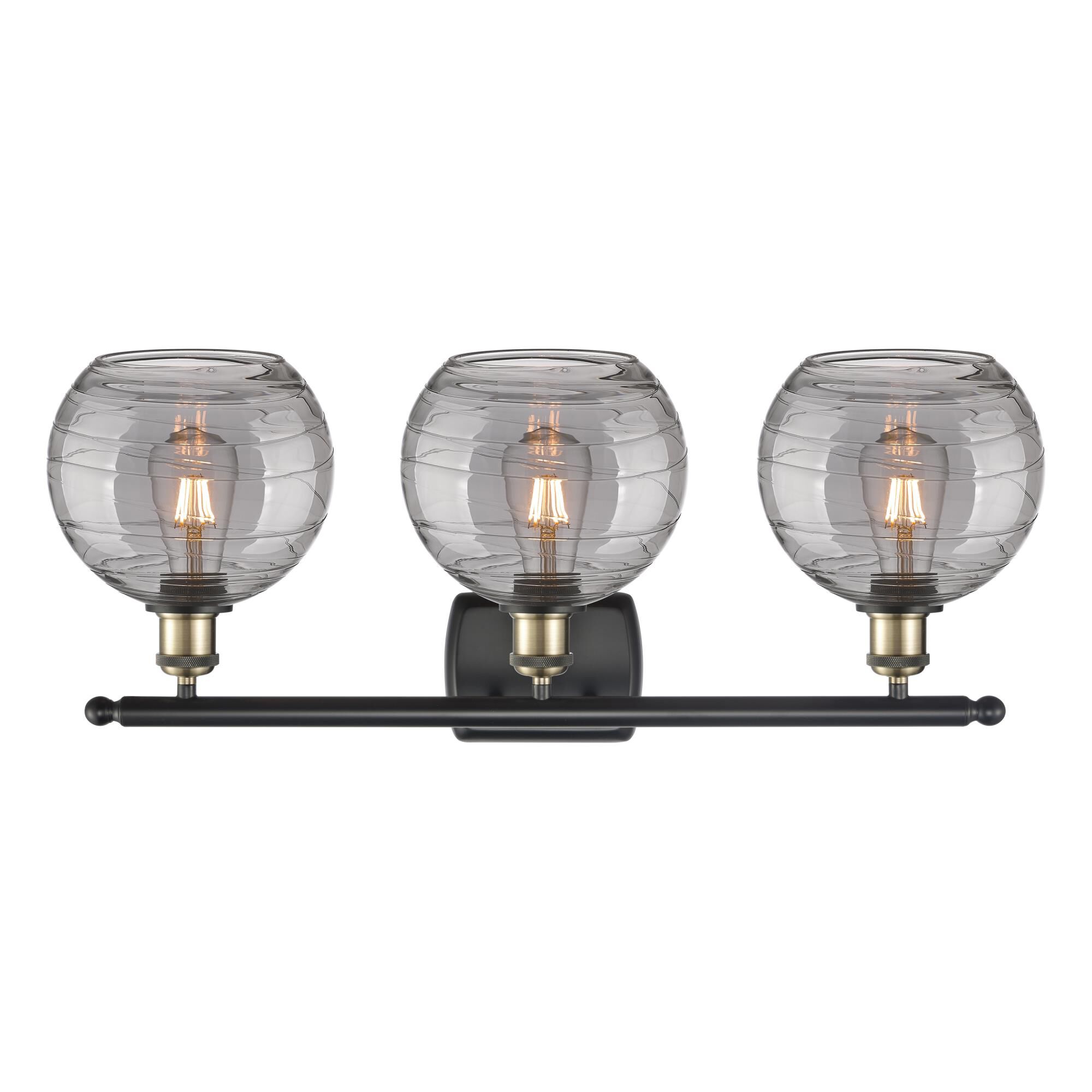 Shown in Black Antique Brass finish and Light Smoke Deco Swirl glass
