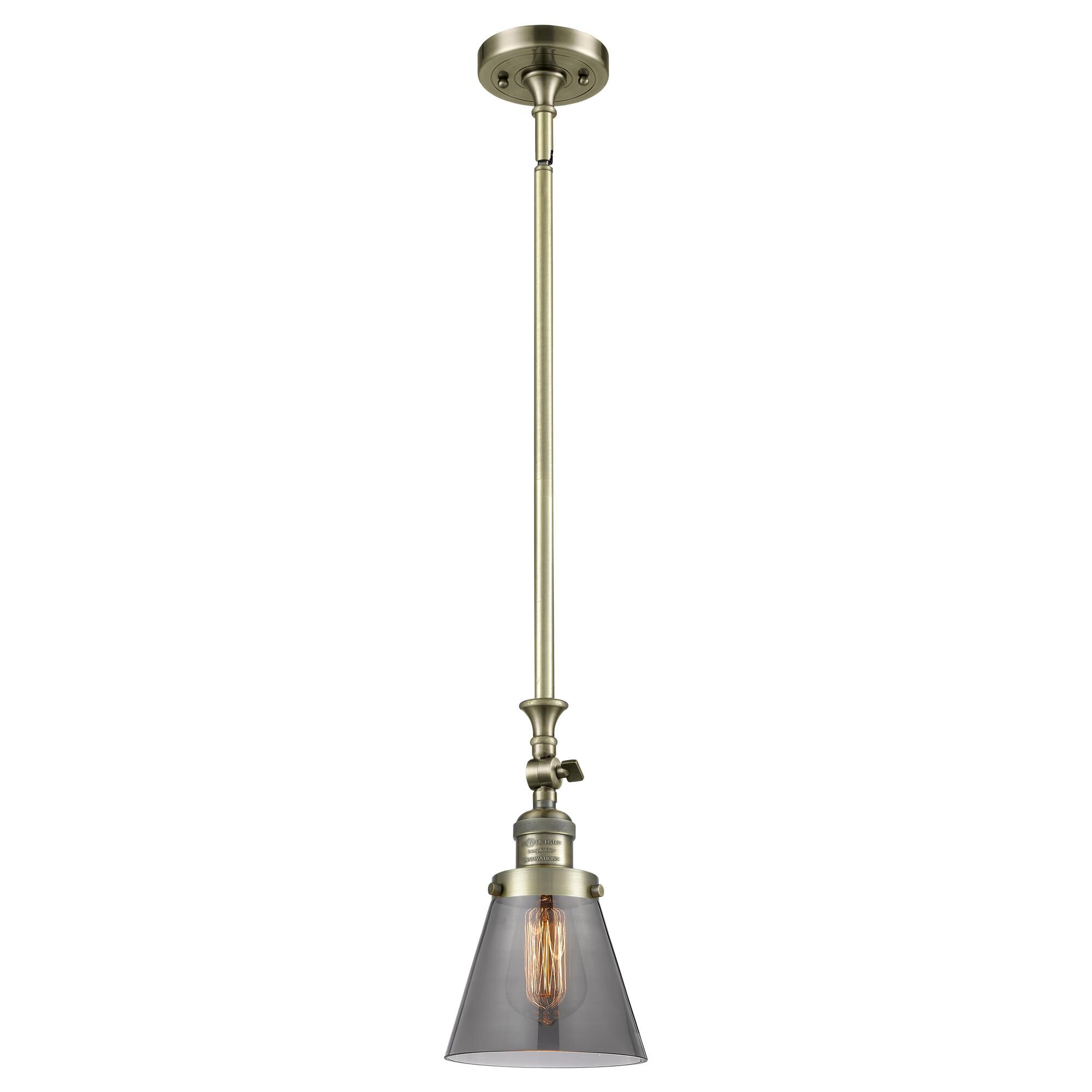 Shown in Antique Brass finish and Smoked glass