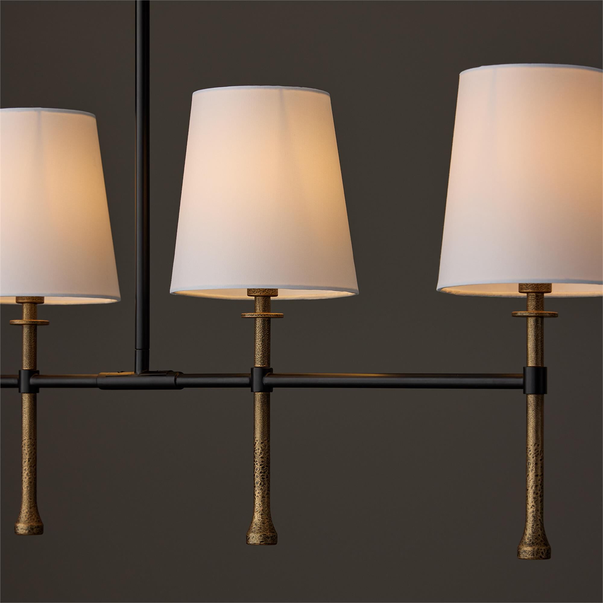 Shown in Matte Black With Hammered Gold finish and White Fabric Stay-Straight s shade