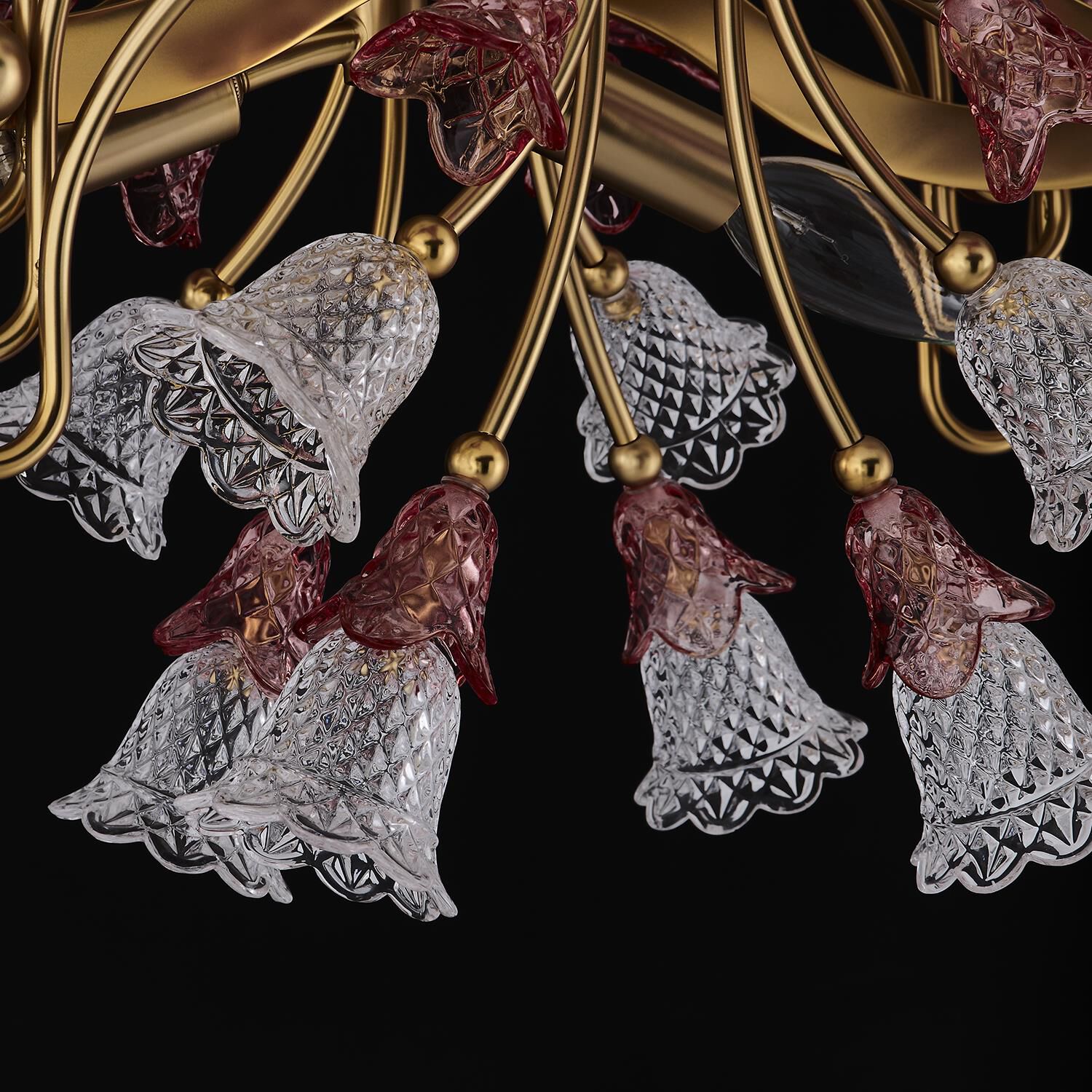 Shown in Antique Brass finish and Vintage Rose crystal