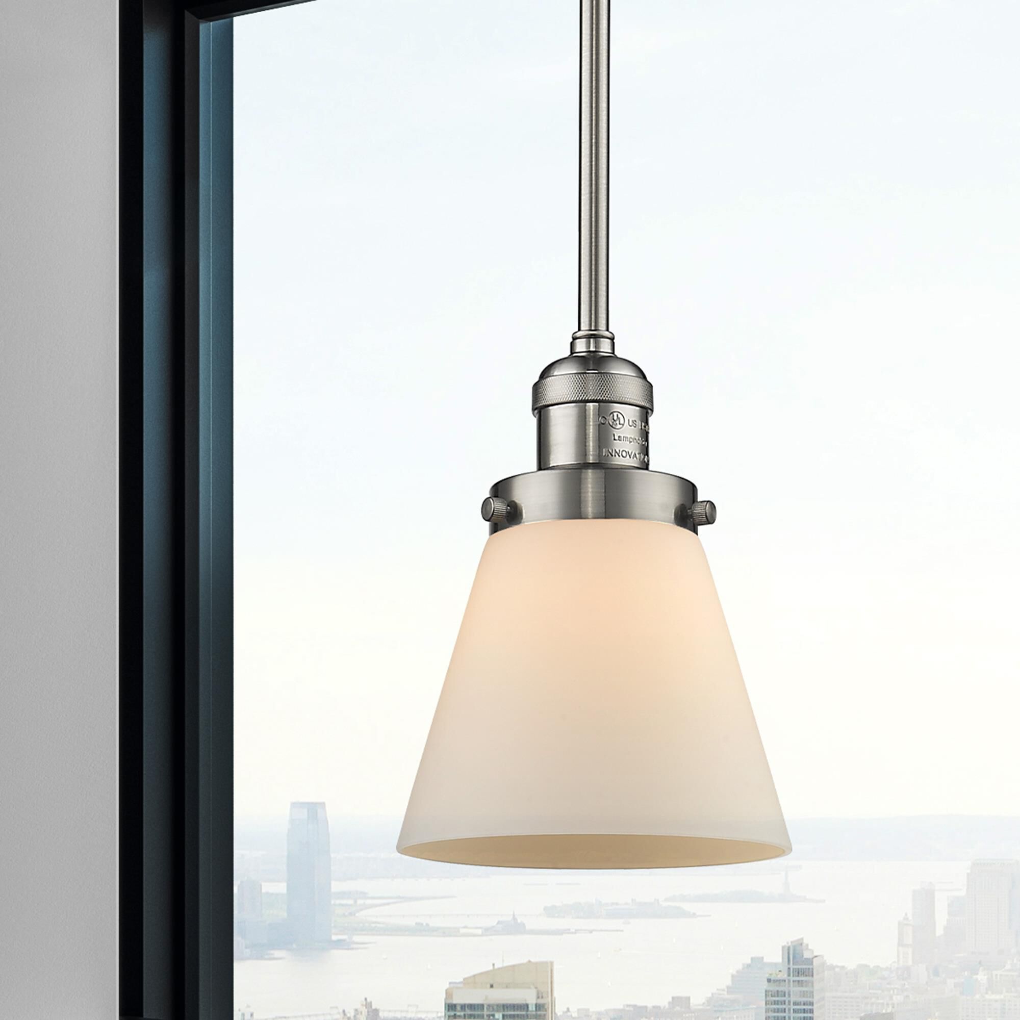 Shown in Brushed Satin Nickel finish and Matte White Cased glass