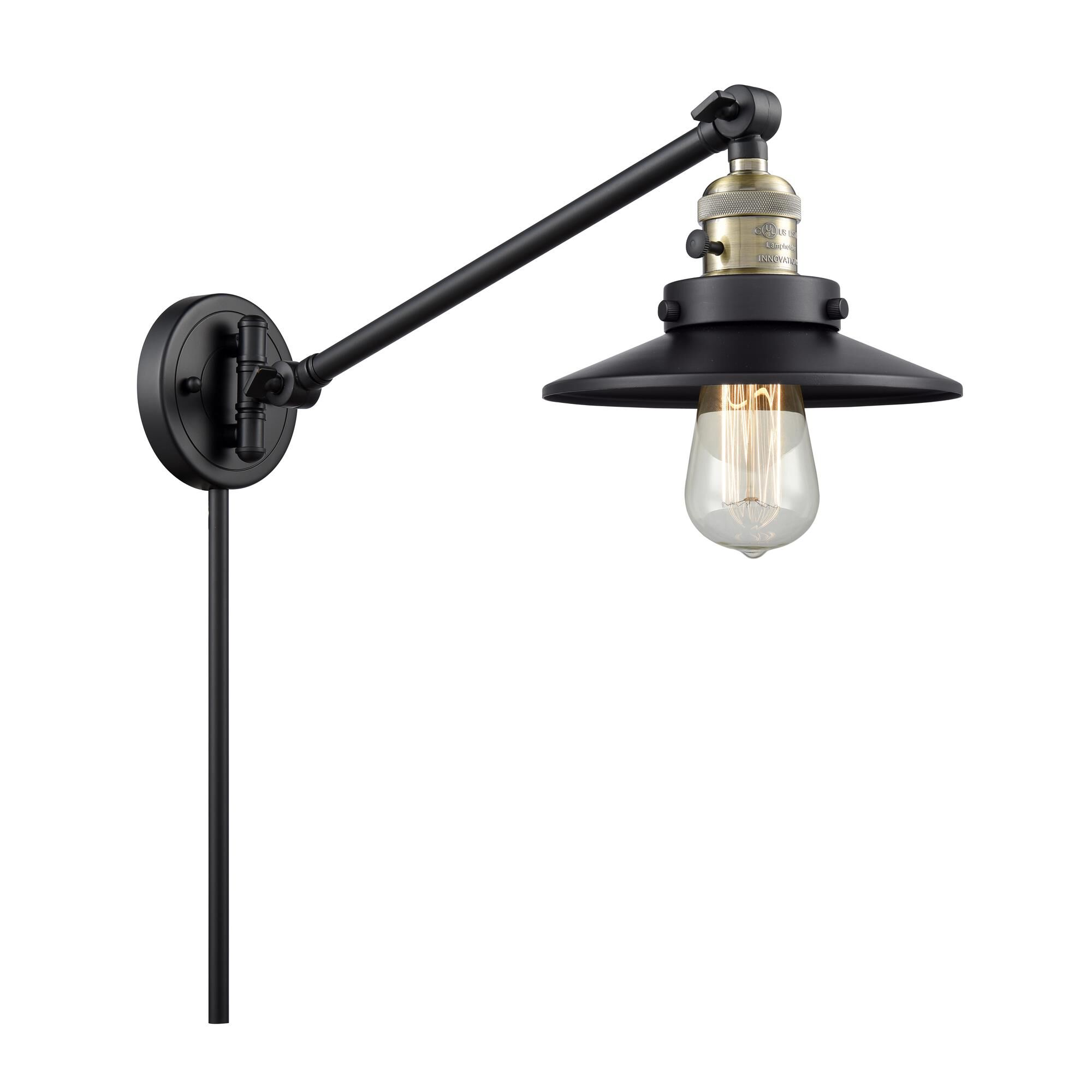 Shown in Black Antique Brass finish and Matte Black shade