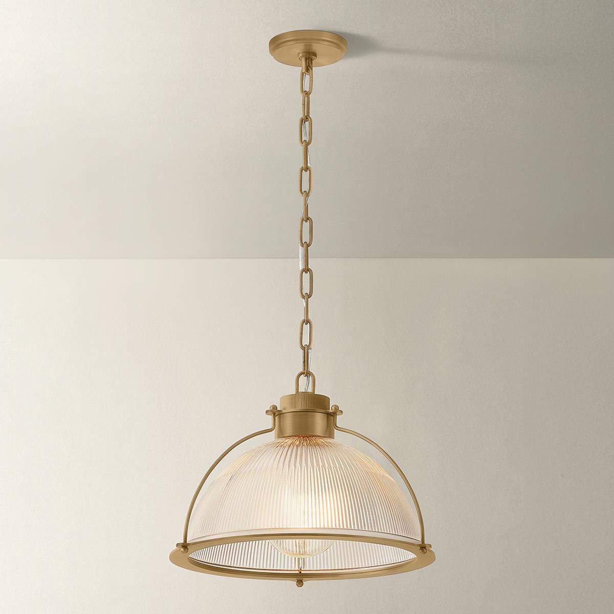 Shown in Patina Brass finish and Holophane glass