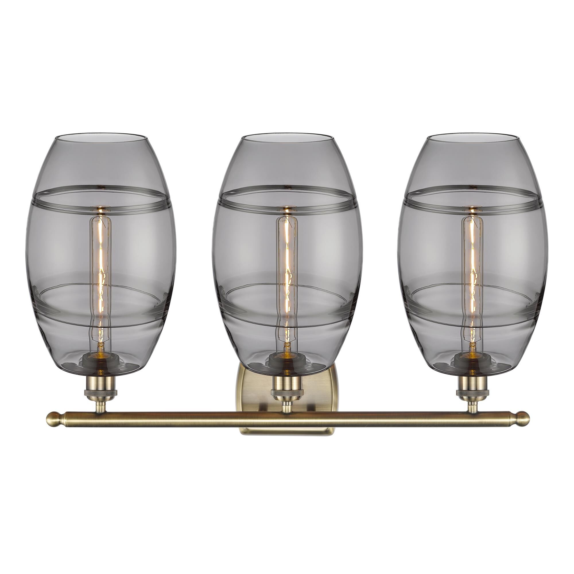 Shown in Antique Brass finish and Light Smoke glass