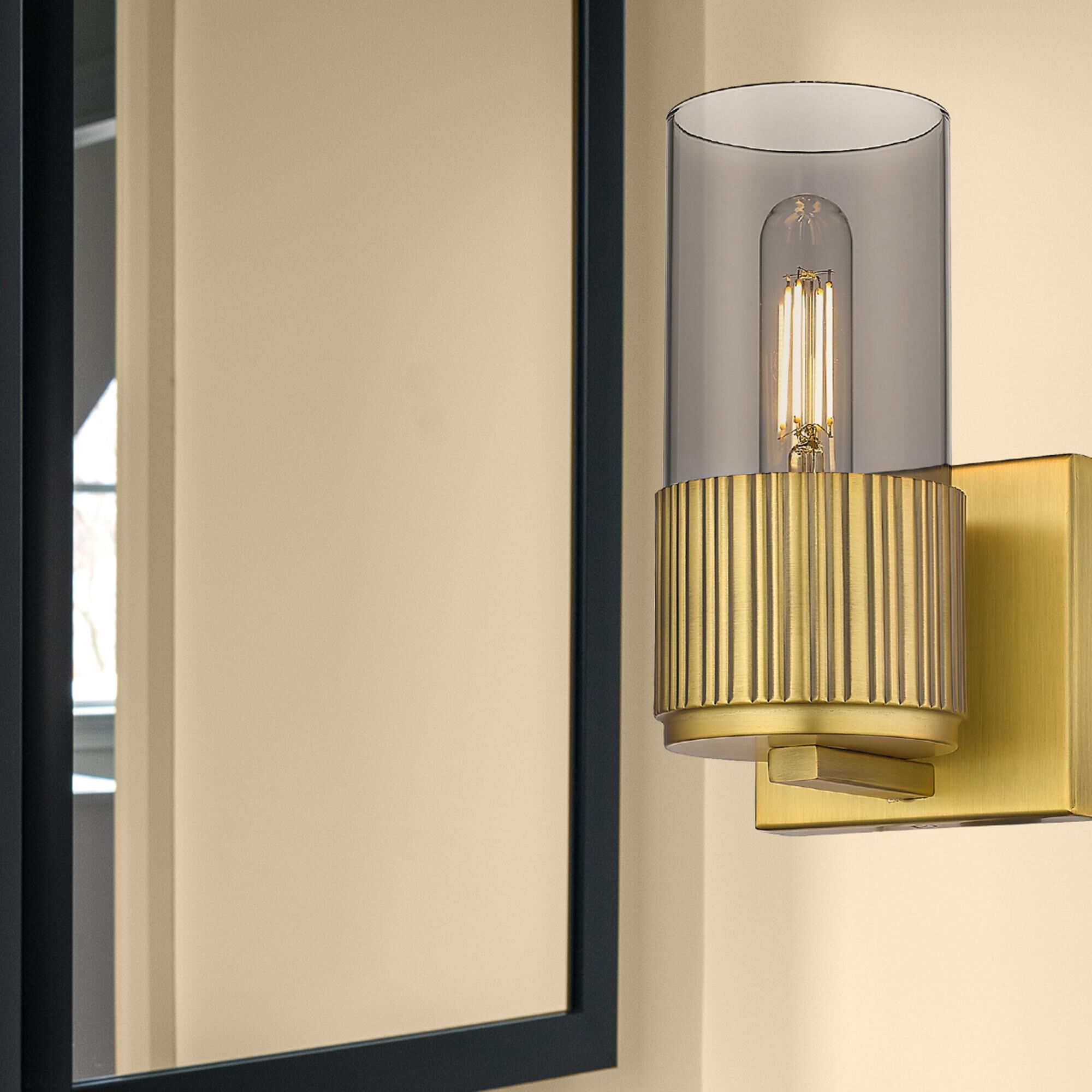 Shown in Brushed Brass finish and Plated Smoke glass