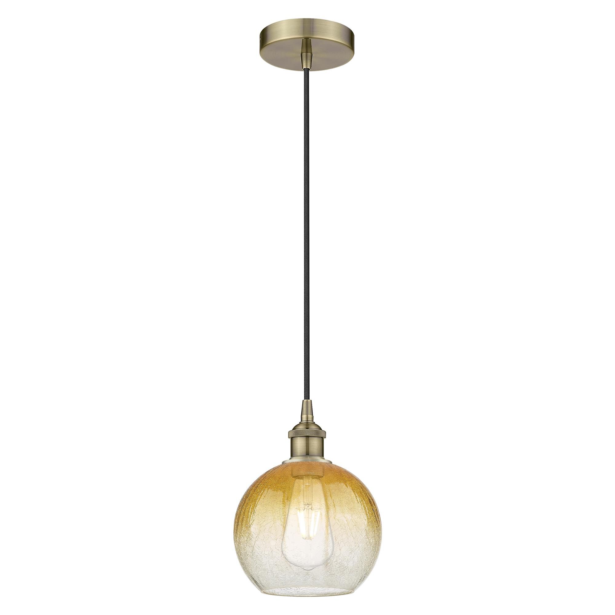 Shown in Antique Brass finish and Amber glass