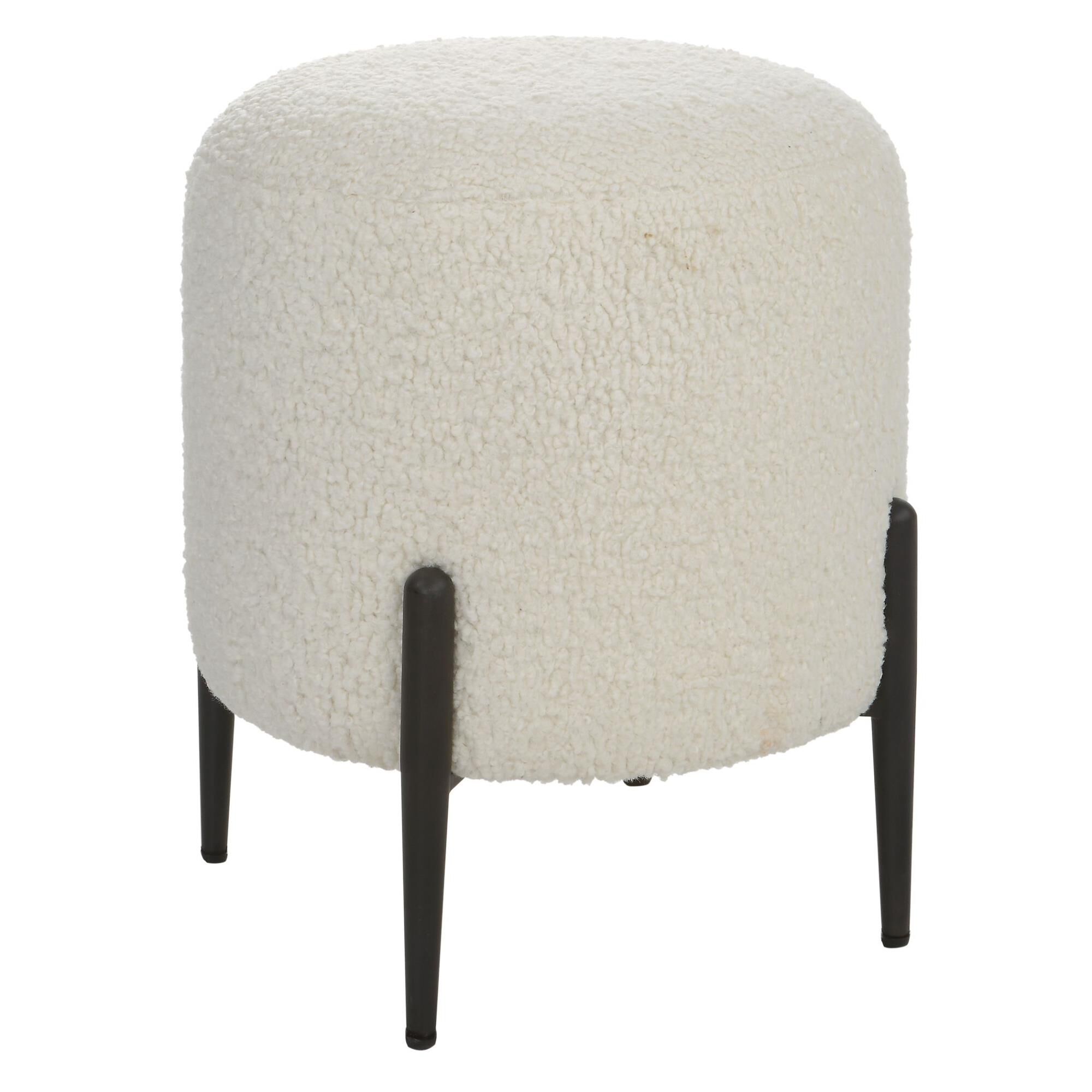 Shown in This Plush Ottoman Is Covered In A Luxurious White Faux Shearling, Suspended Within Satin Black Fini finish