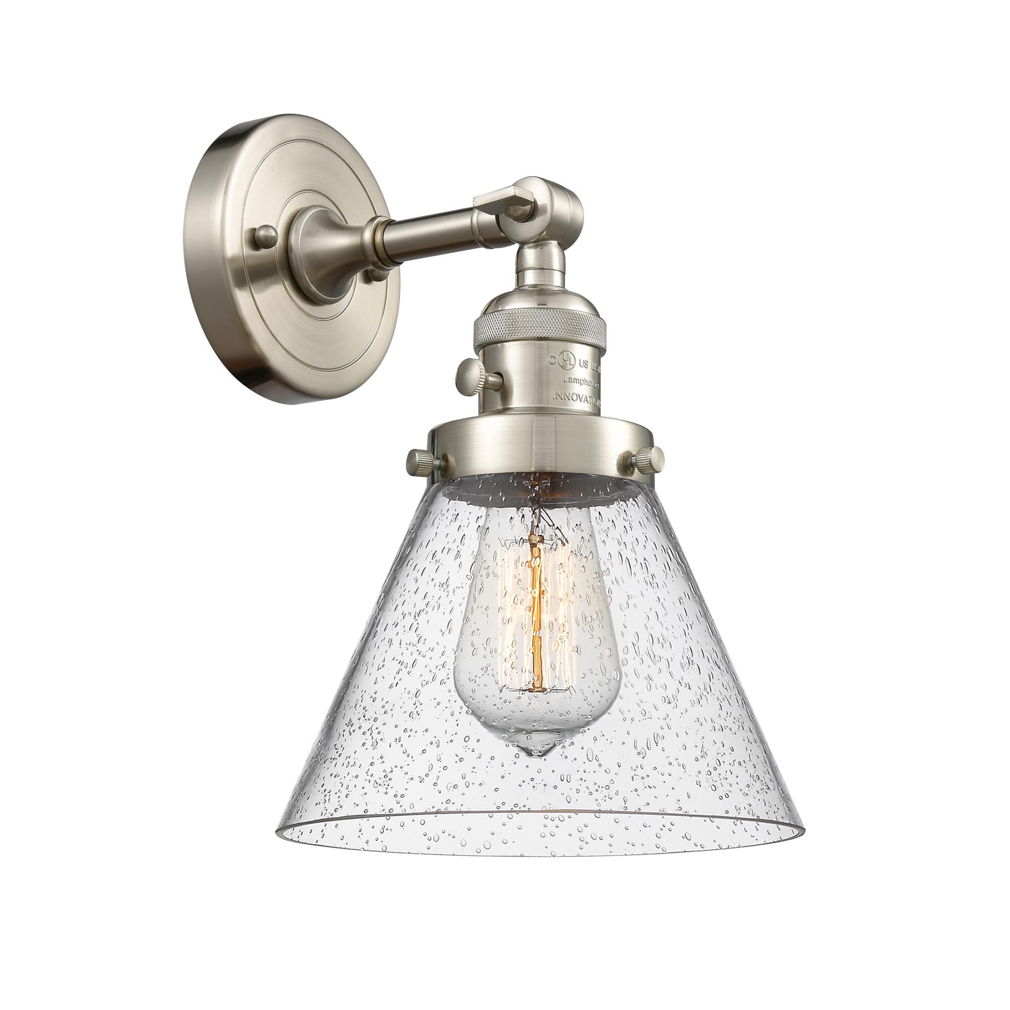 Shown in Brushed Satin Nickel finish and Seedy glass and Brushed Satin Nickel shade and Switch on Socket accent