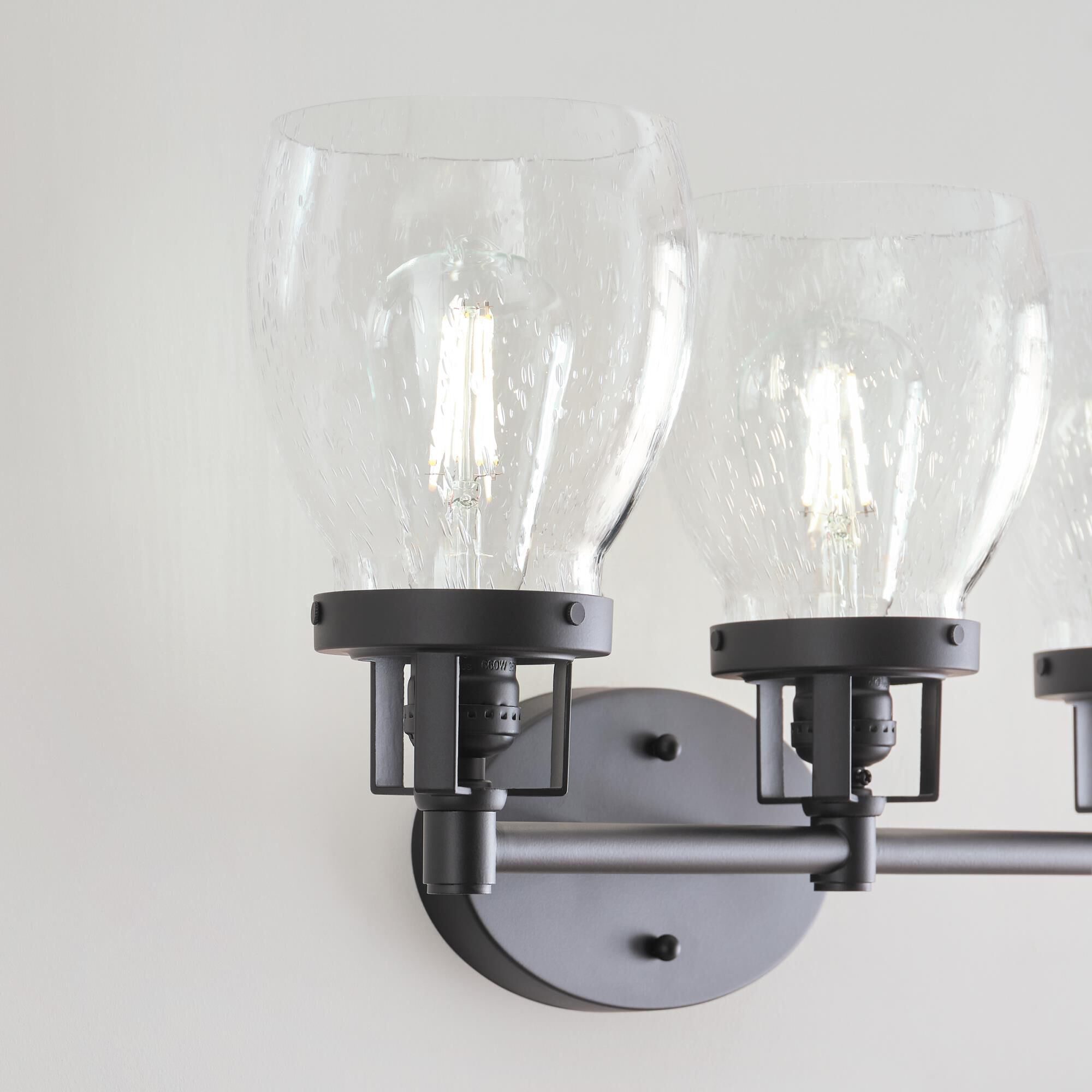 Shown in Midnight Black finish and Clear Seeded glass