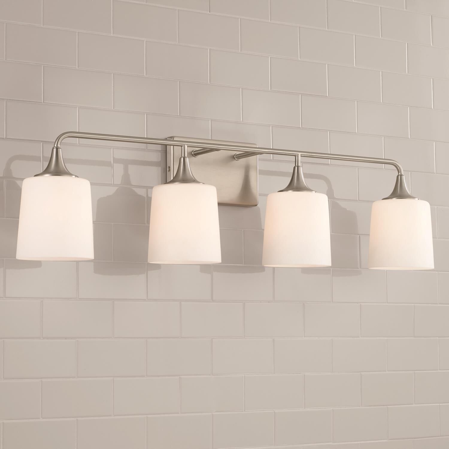 Shown in Brushed and Satin Nickel finish and Soft White glass