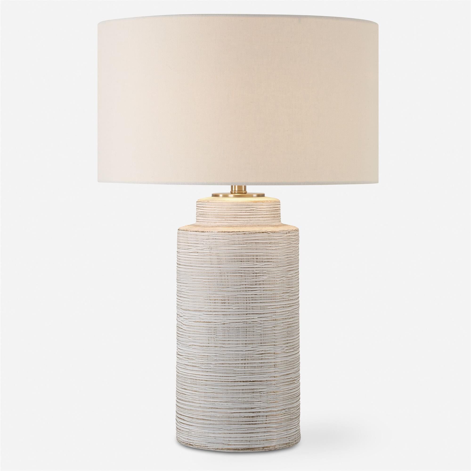 Shown in This Ceramic Table Lamp Features Heavy Ribbed Texture Finished In A Heavily Distressed Ivory Glaze W finish and Round Hardback shade