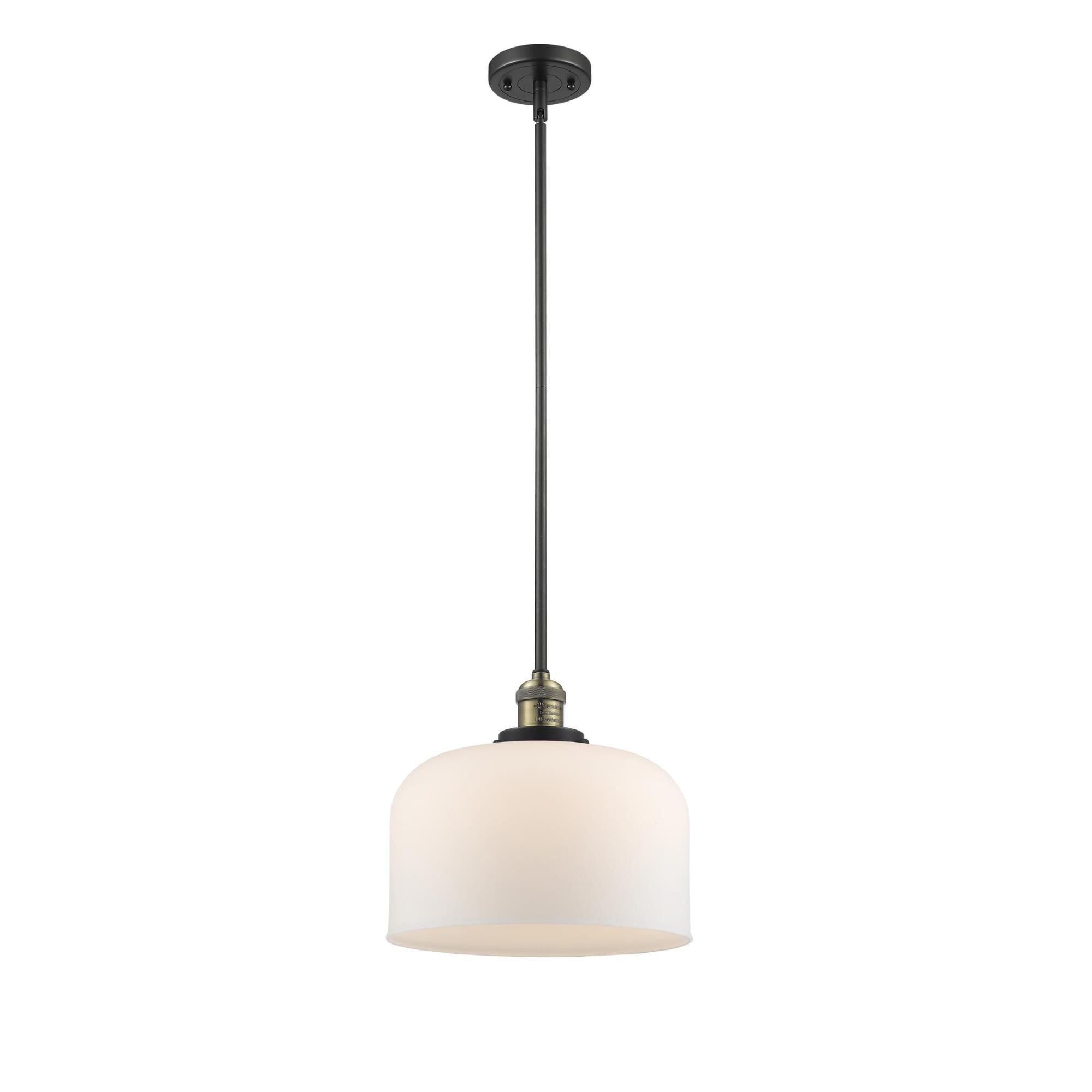 Shown in Black Antique Brass finish and Matte White Cased glass