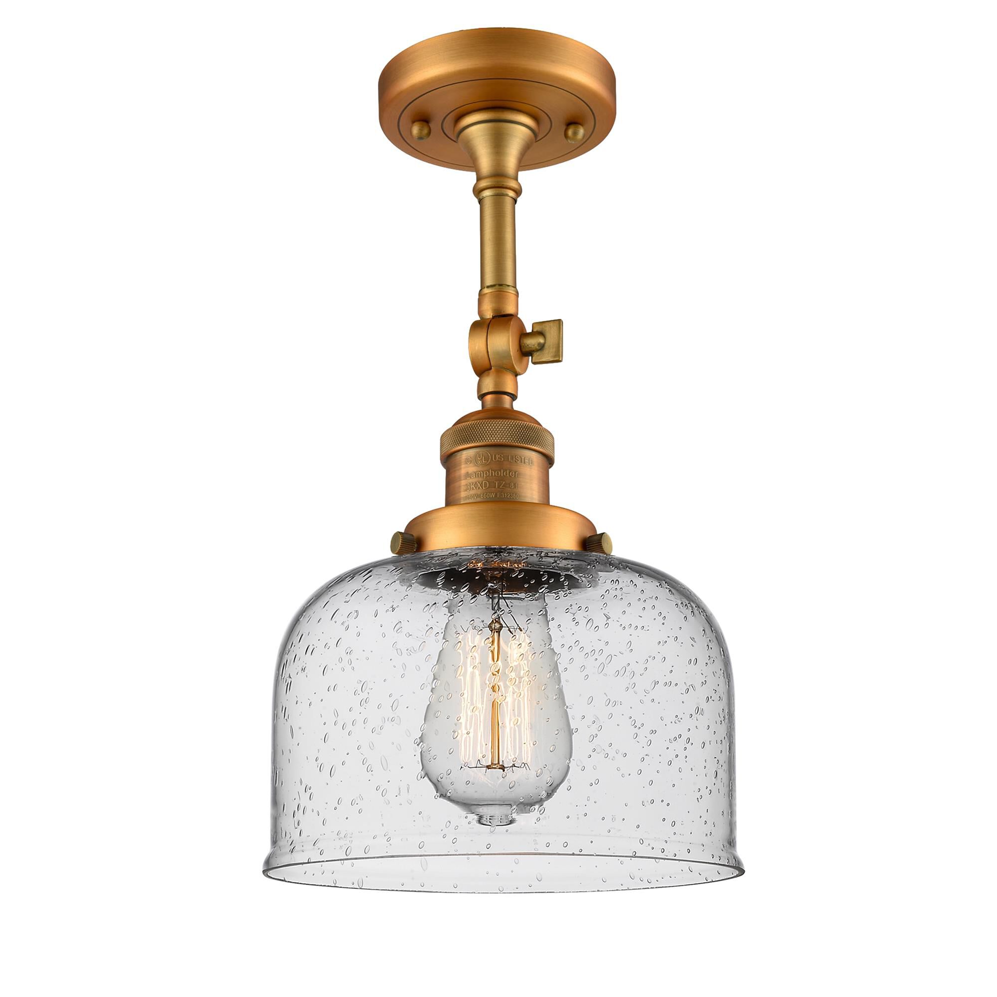 Shown in Brushed Brass finish and Seedy glass