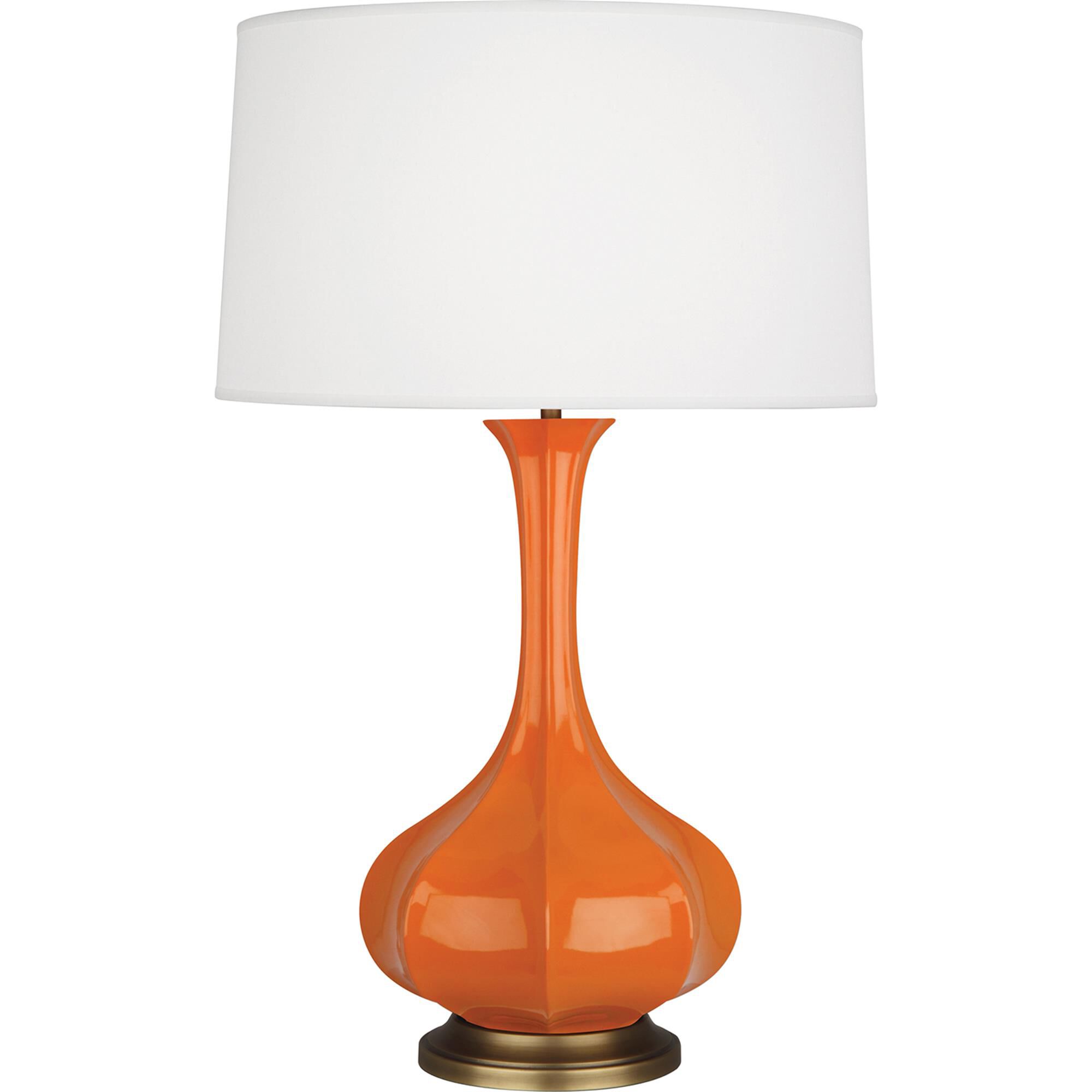 Shown in Pumpkin Glazed Ceramic With Aged Brass Accents finish and Pearl Dupoini Fabric shade