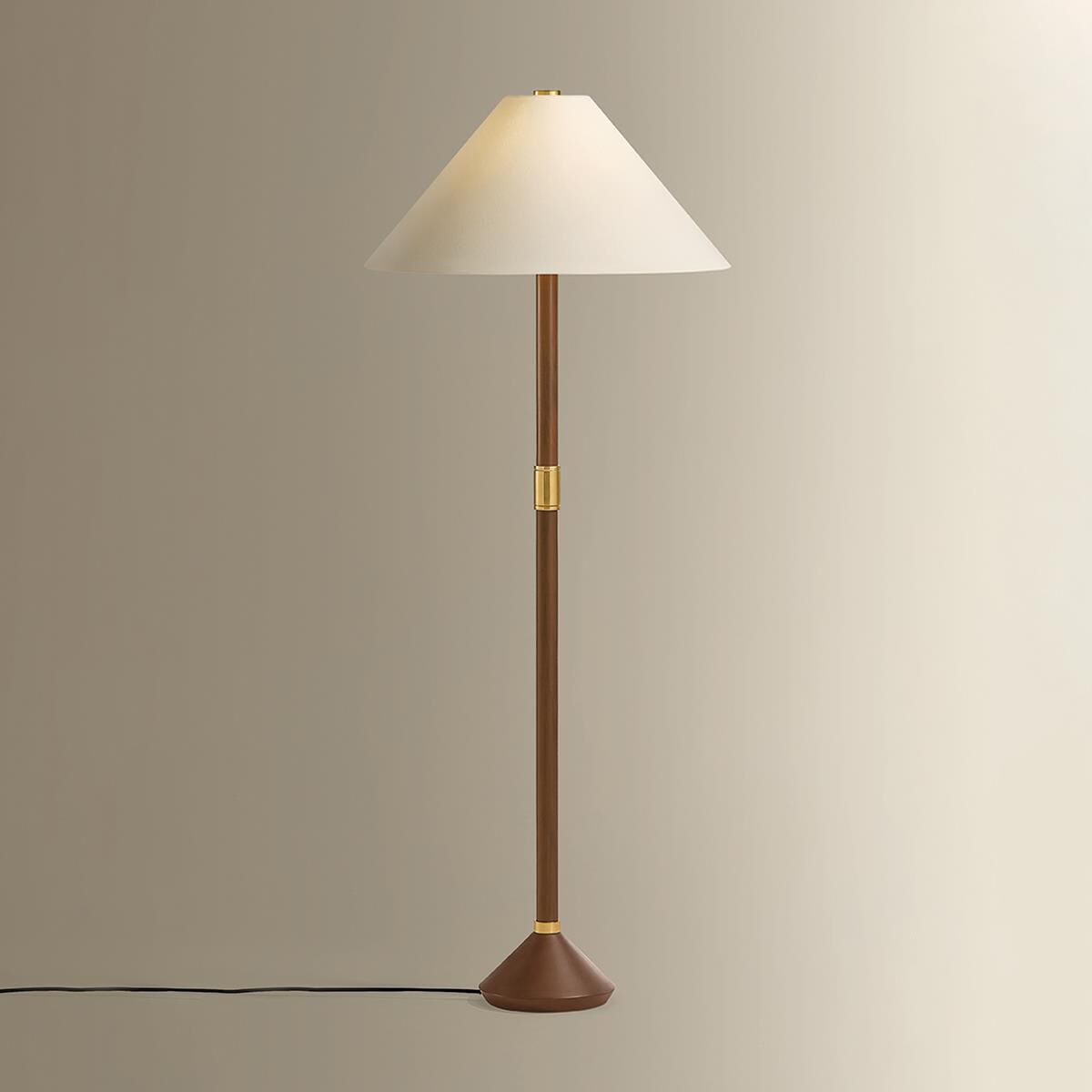 Shown in Aged Brass finish and White Linen shade