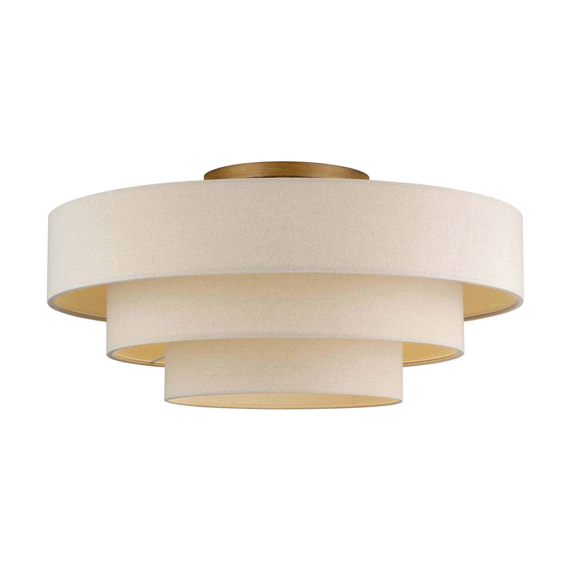 Shown in Antique Gold Leaf finish and Hand Crafted Parchment Color Hardback Fabric shade