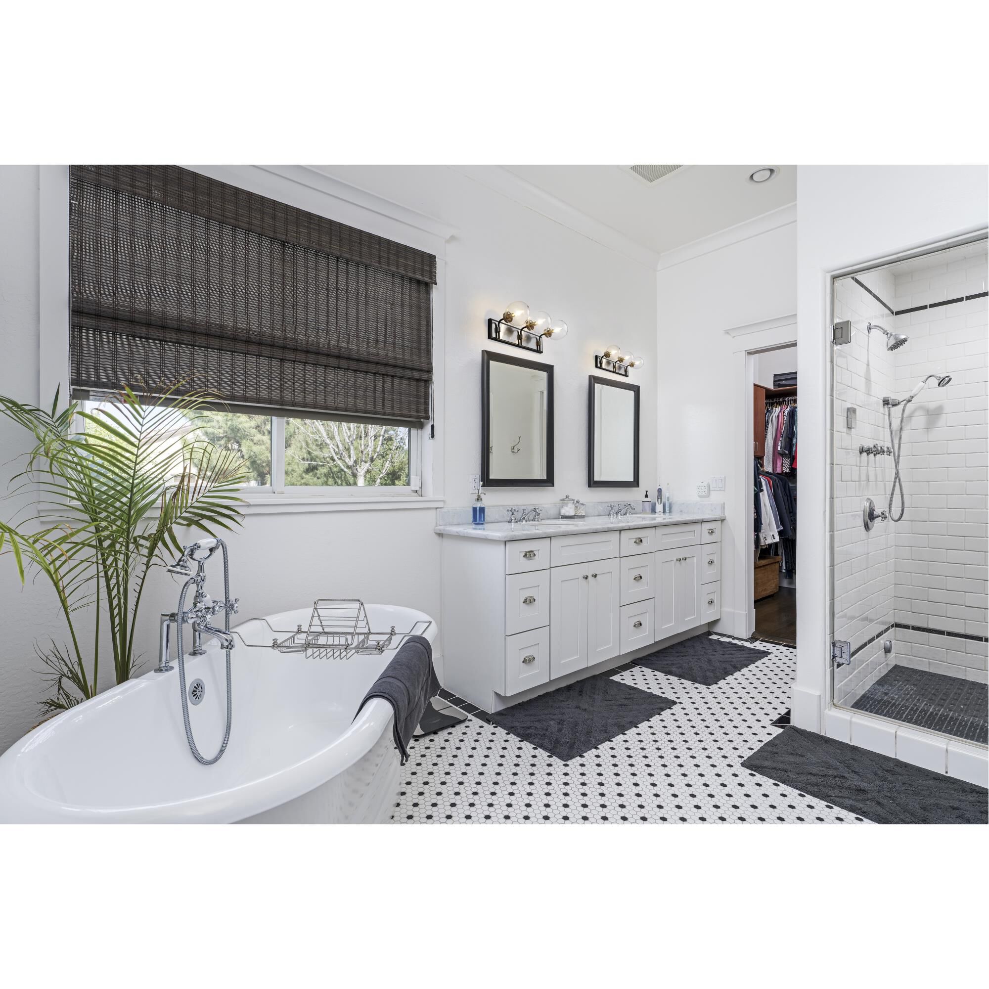 Shown in Matte Black + Brushed Nickel finish and Glass shade