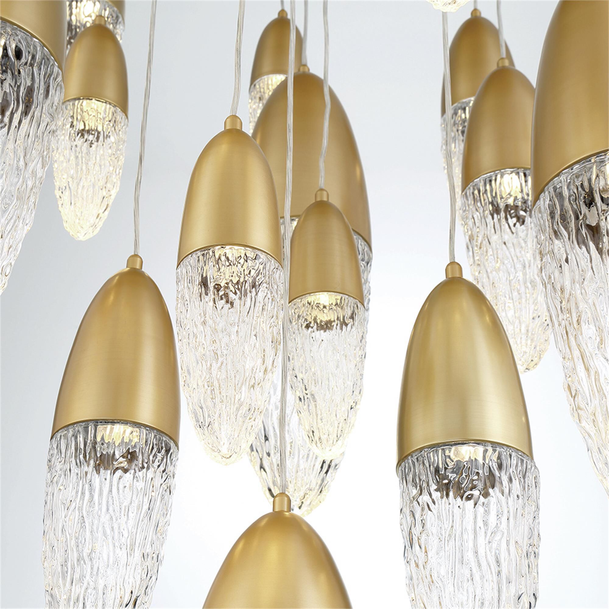 Shown in Gold finish and Clear glass