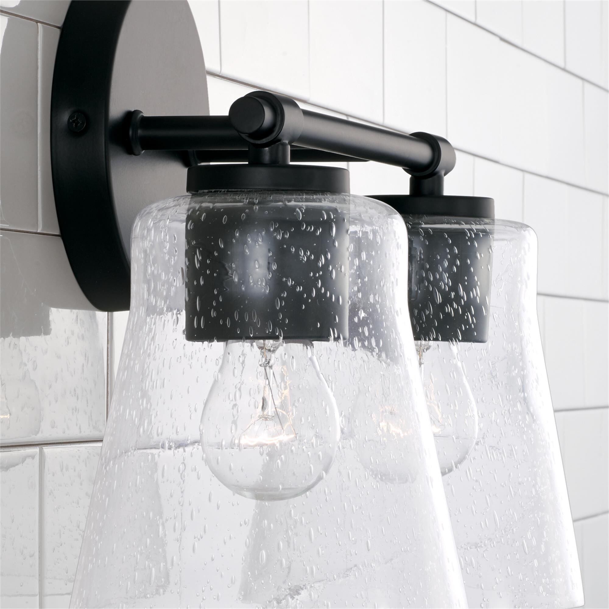 Shown in Matte Black finish and Clear Seeded glass