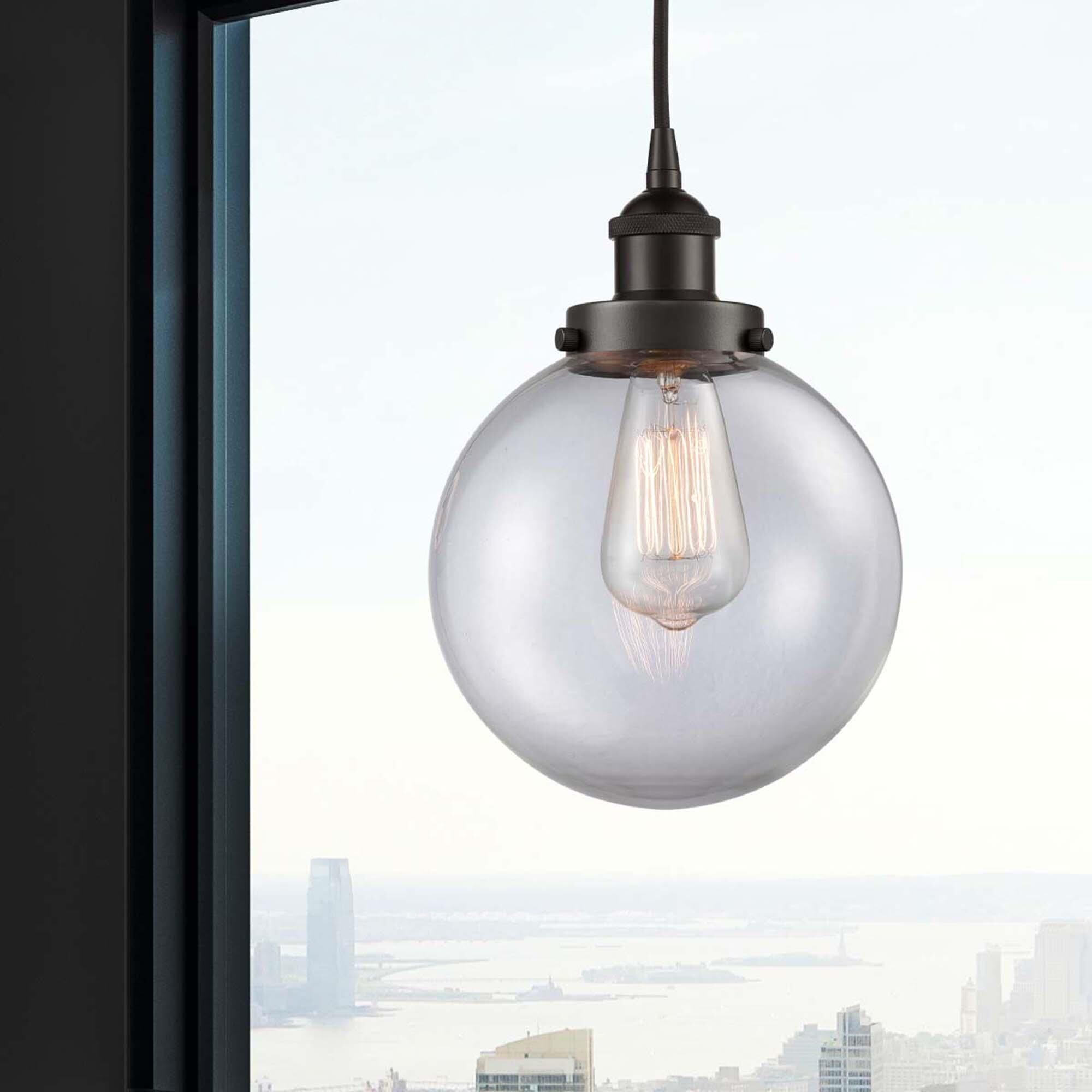 Shown in Oil Rubbed Bronze finish and Clear Beacon glass