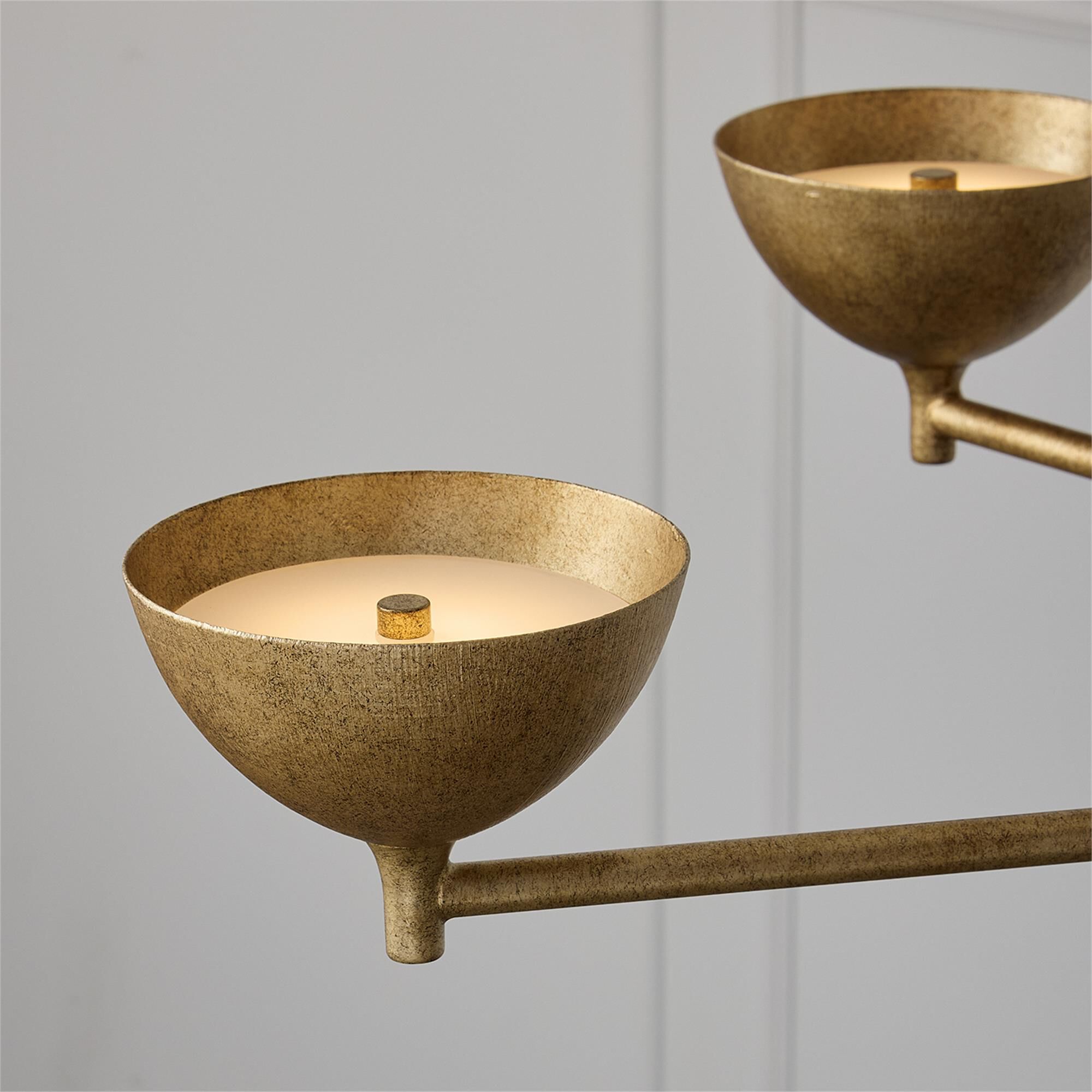 Shown in Feathered Gold finish and Textured Metal shade