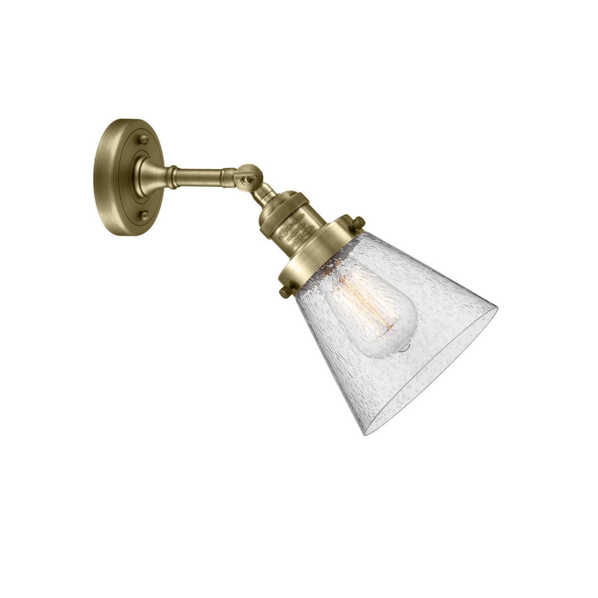 Shown in Antique Brass finish and Seedy glass and None accent