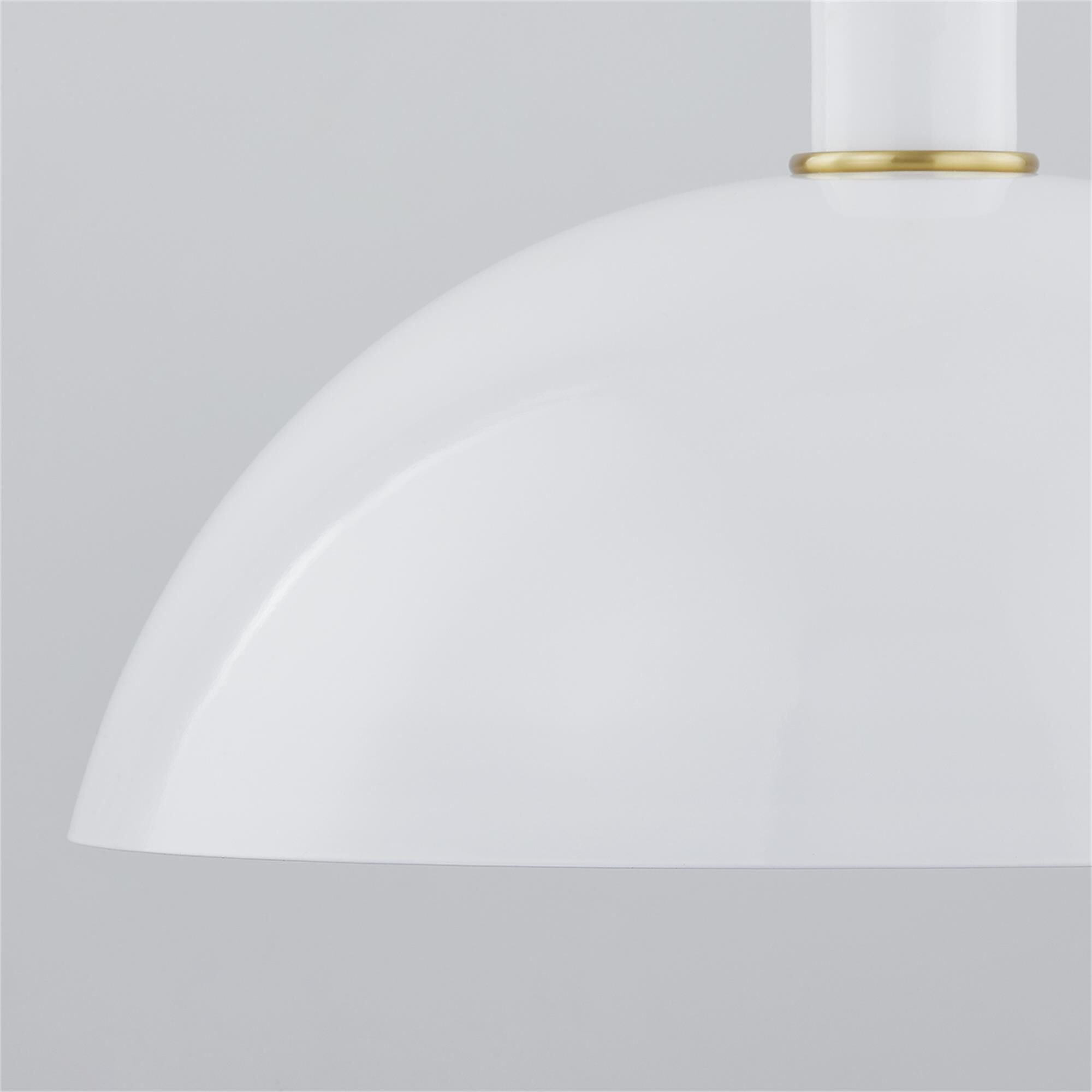 Shown in Aged Brass and Glossy White finish and Metal shade