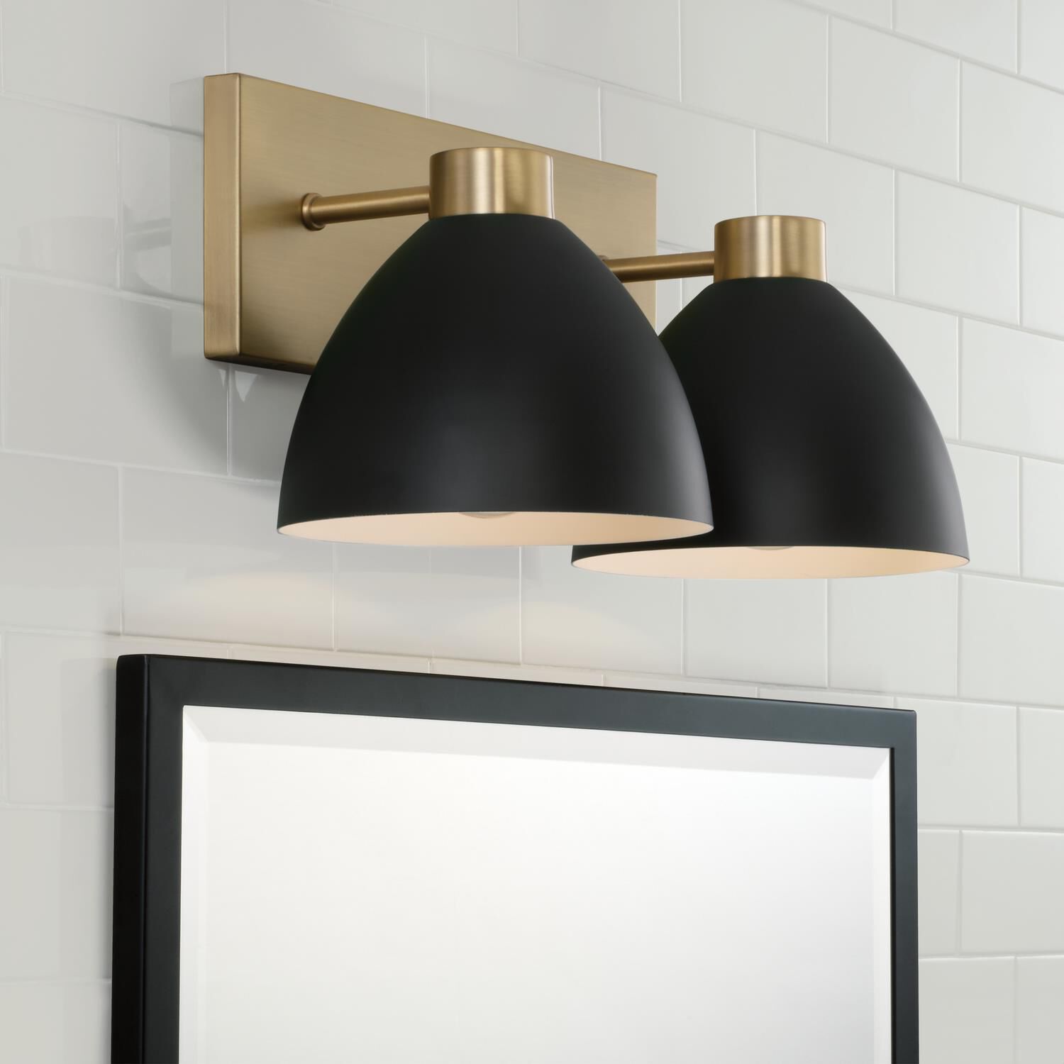 Shown in Aged Brass And Black finish and Matte Black Metal  With White Interior shade