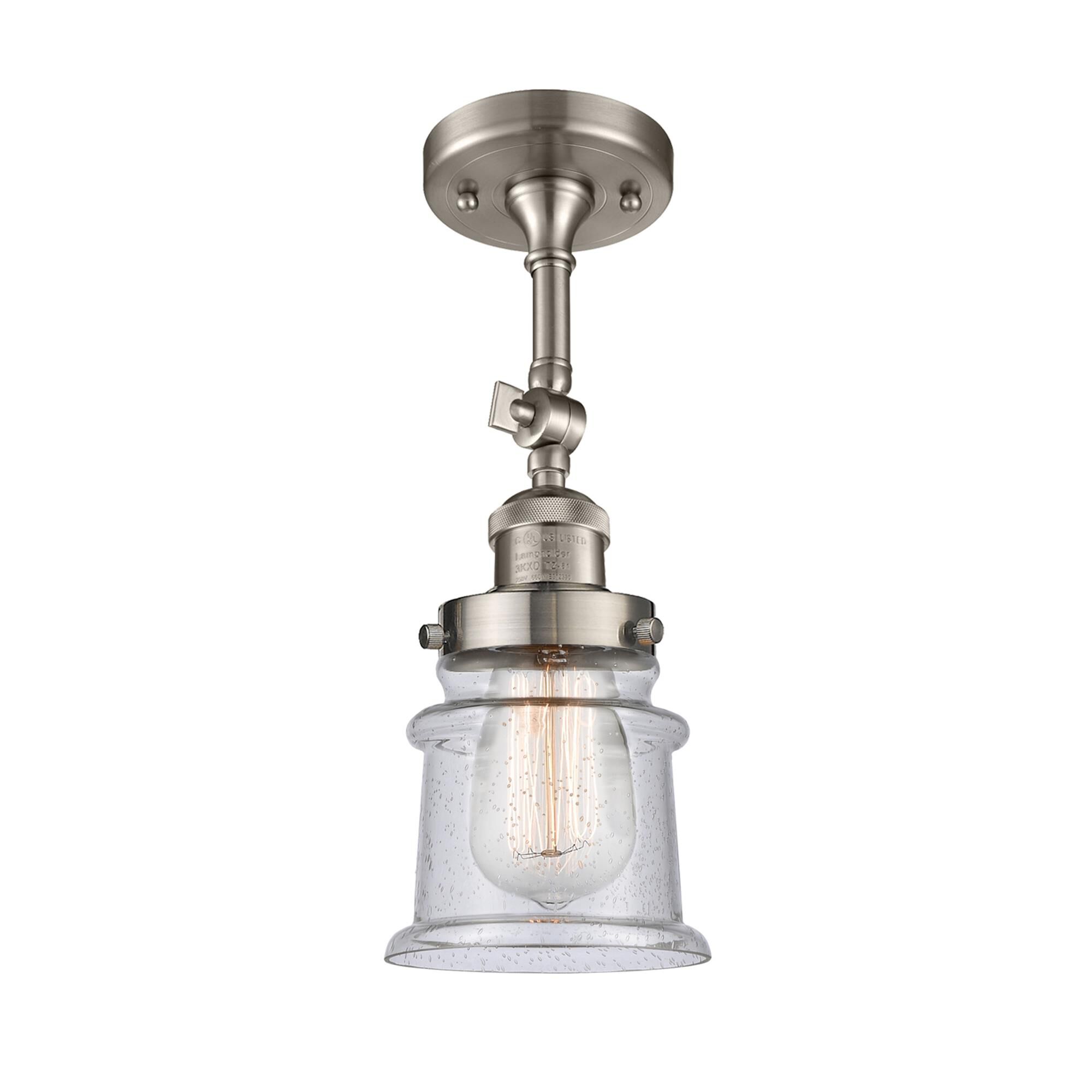 Shown in Brushed Satin Nickel finish and Seedy glass and None accent