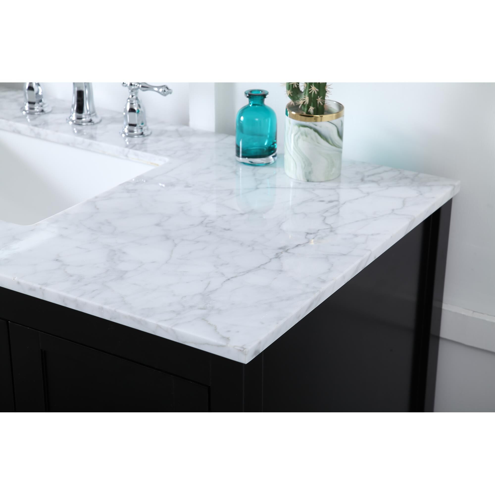 Shown in Black And Brushed Nickel With Carrara White Marble finish