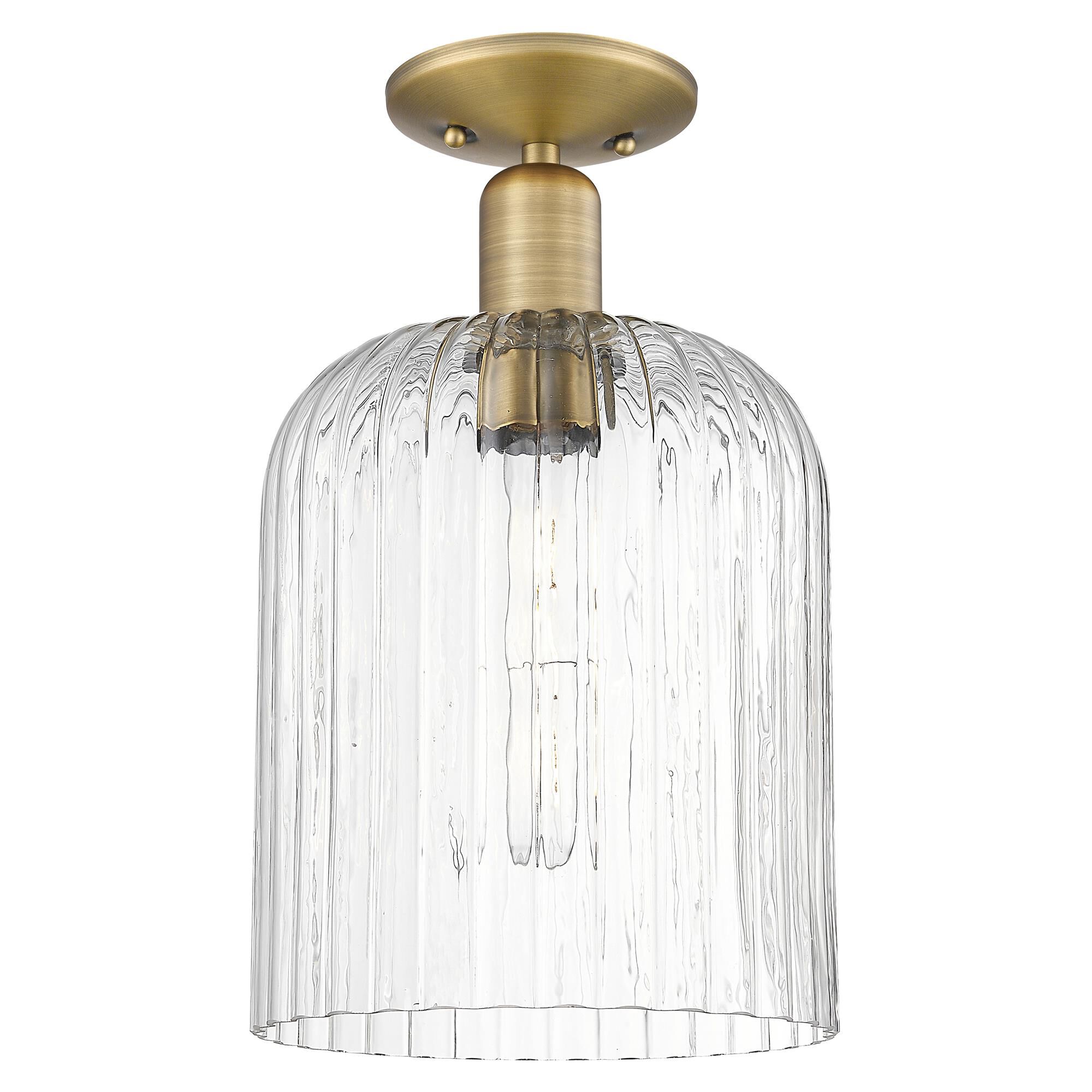 Shown in Brushed Brass finish and Clear glass