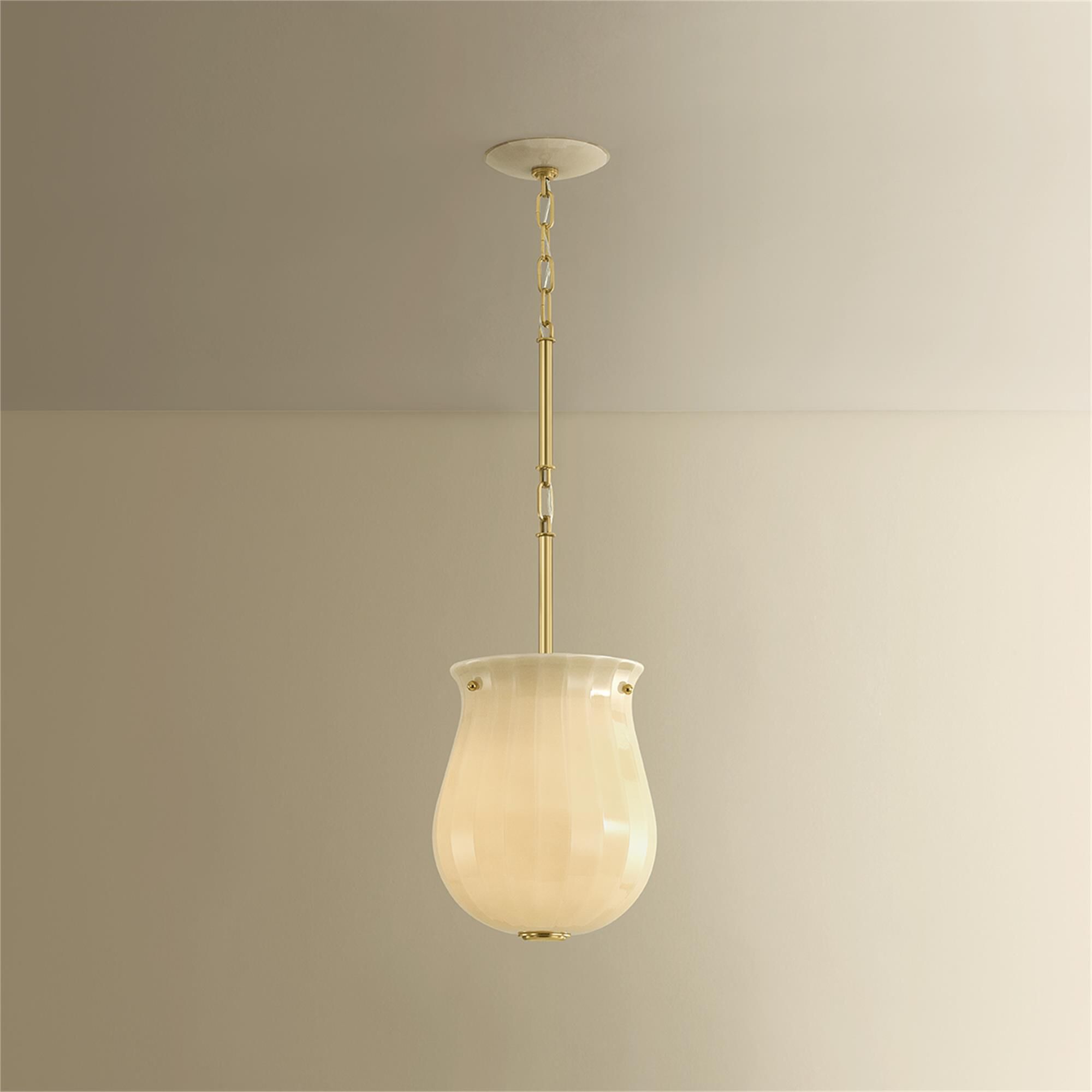 Shown in Aged Brass finish and Champagne glass