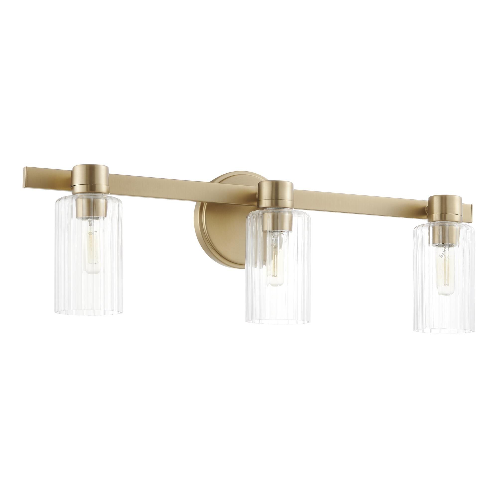 Shown in Champagne Gold finish and Clear Ribbed glass