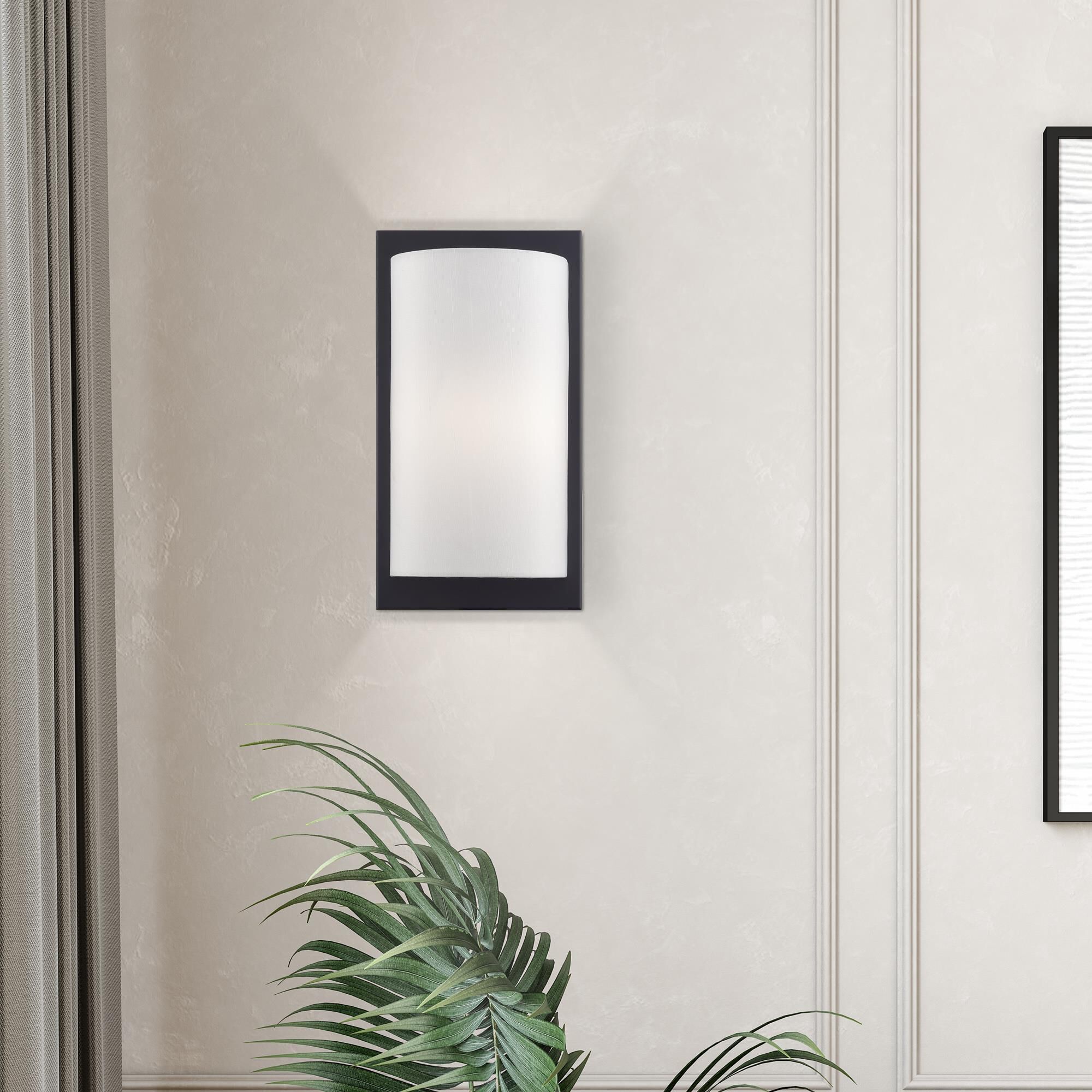 Shown in Black finish and Hand Crafted Off-White Fabric Hardback shade