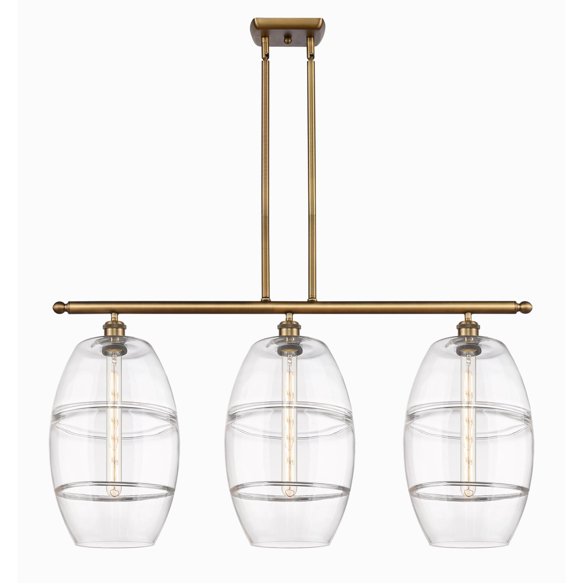 Shown in Brushed Brass finish and Clear glass