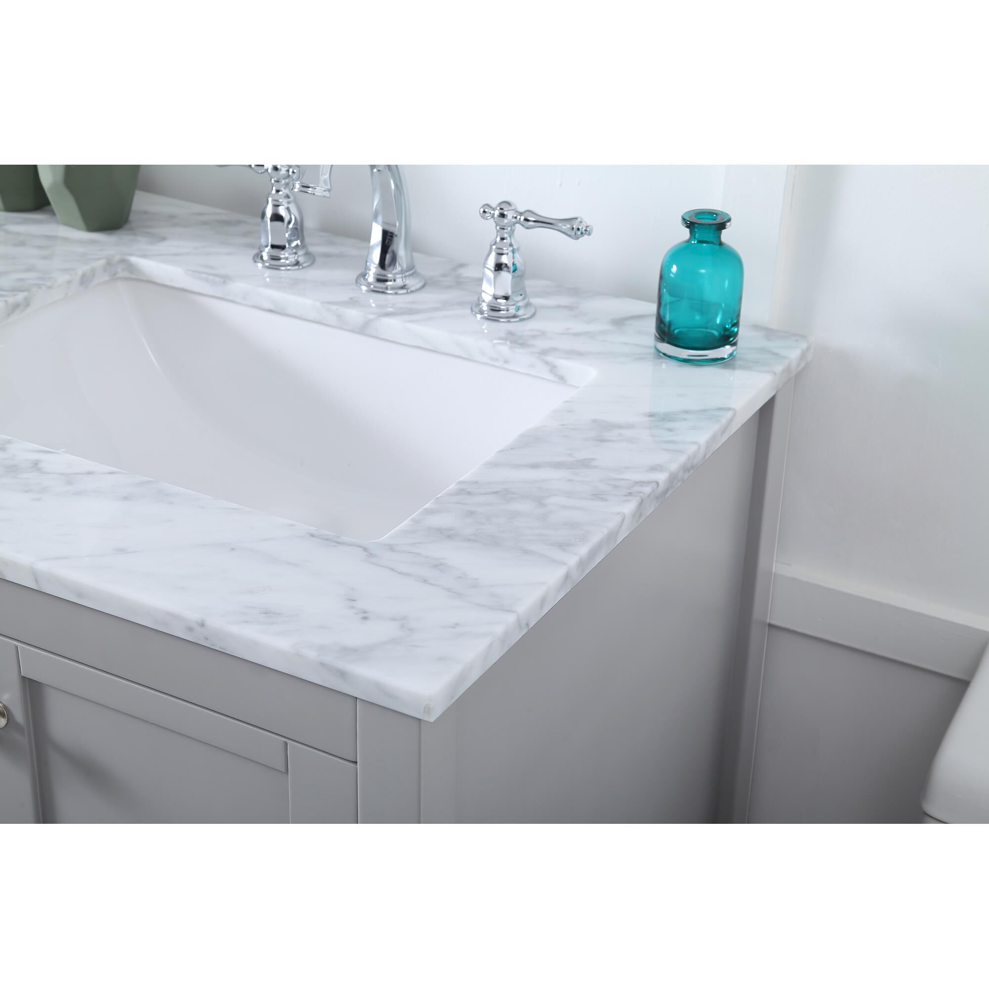 Shown in Gray And Brushed Nickel With Carrara White Marble finish