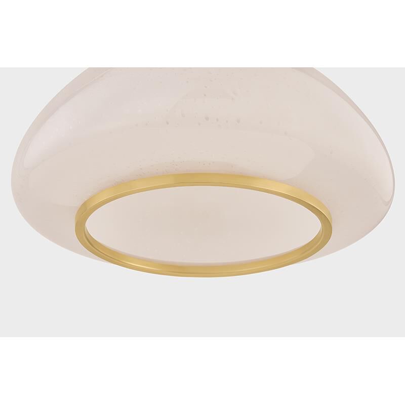 Shown in Aged Brass finish and Seeded Cloud glass