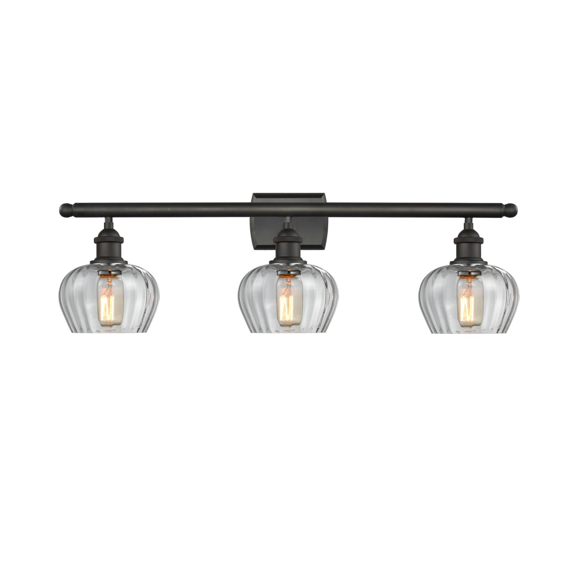 Shown in Oil Rubbed Bronze finish and Clear Fluted glass