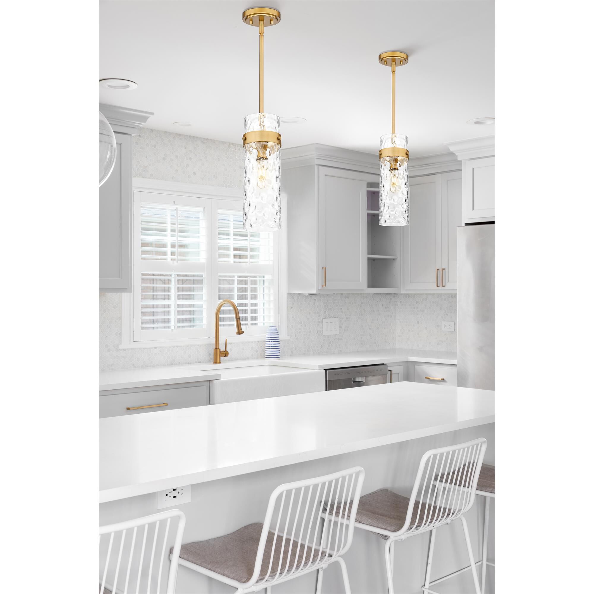 Shown in Rubbed Brass finish and Clear Water glass and Clear Water shade